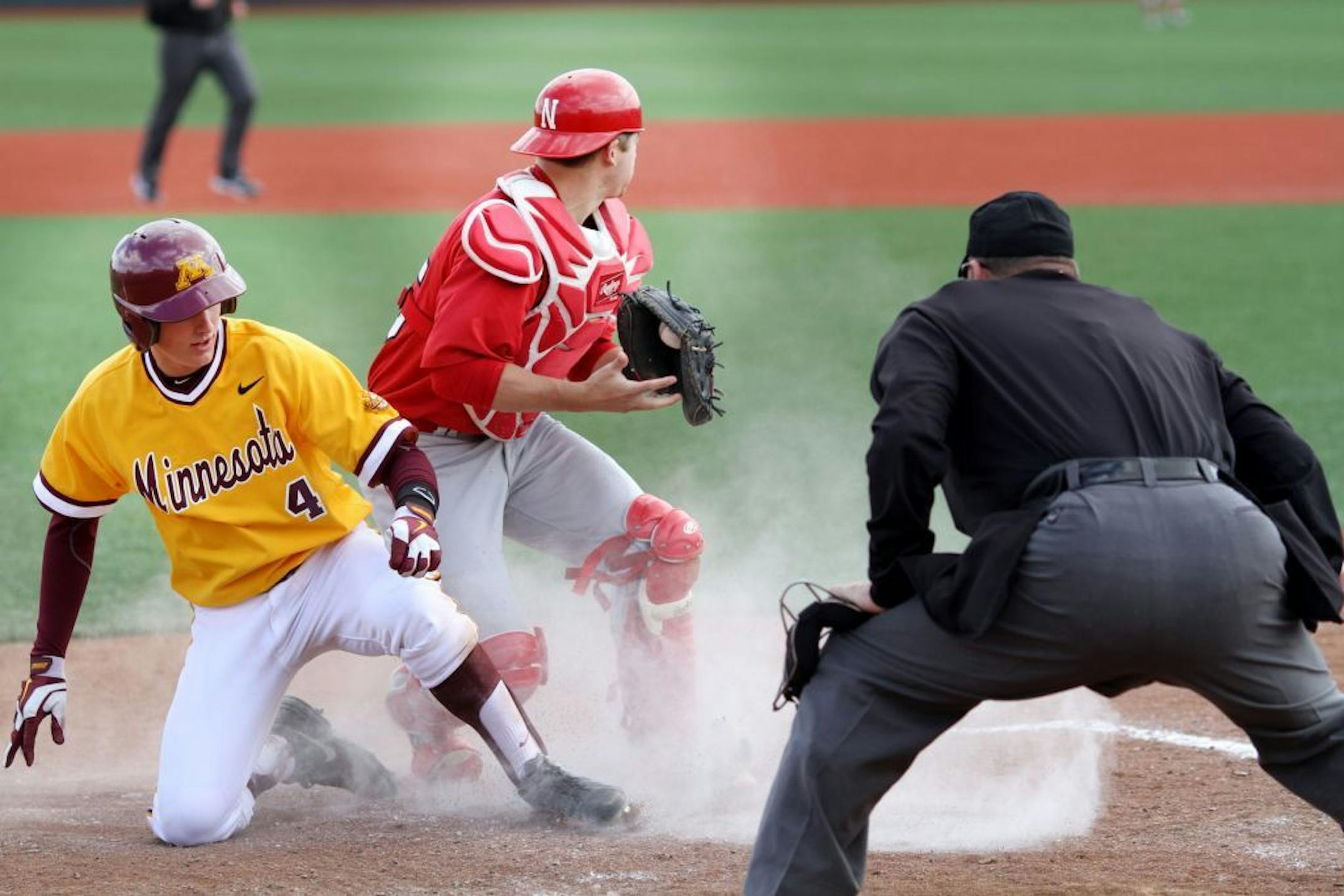 Connor Schaefbauer slid into home while playing Nebraska on Saturday afternoon.