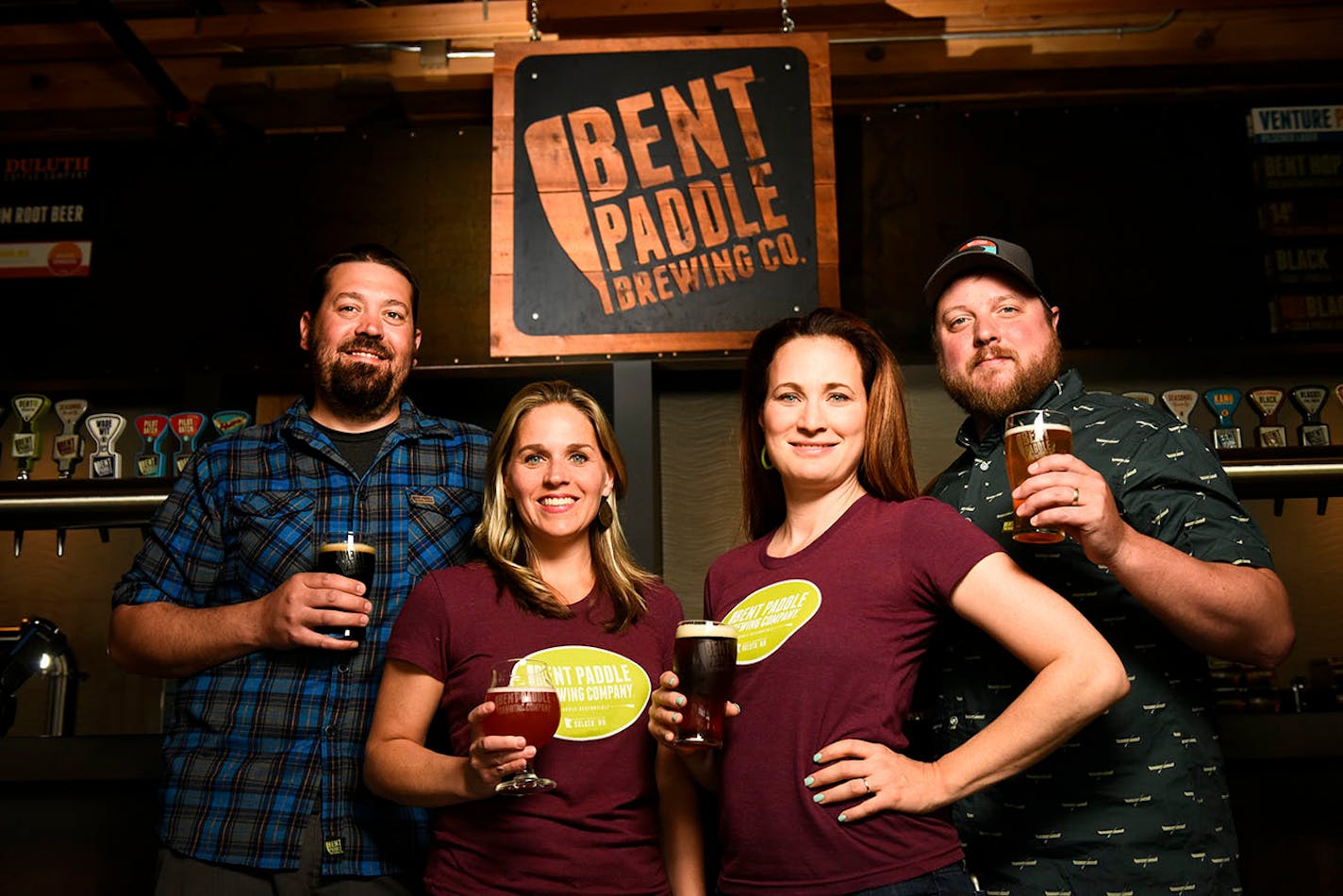 From left, Bent Paddle Brewing Company's Bryon and Karen Tonnis and Colin and Laura Mullen Thursday afternoon.