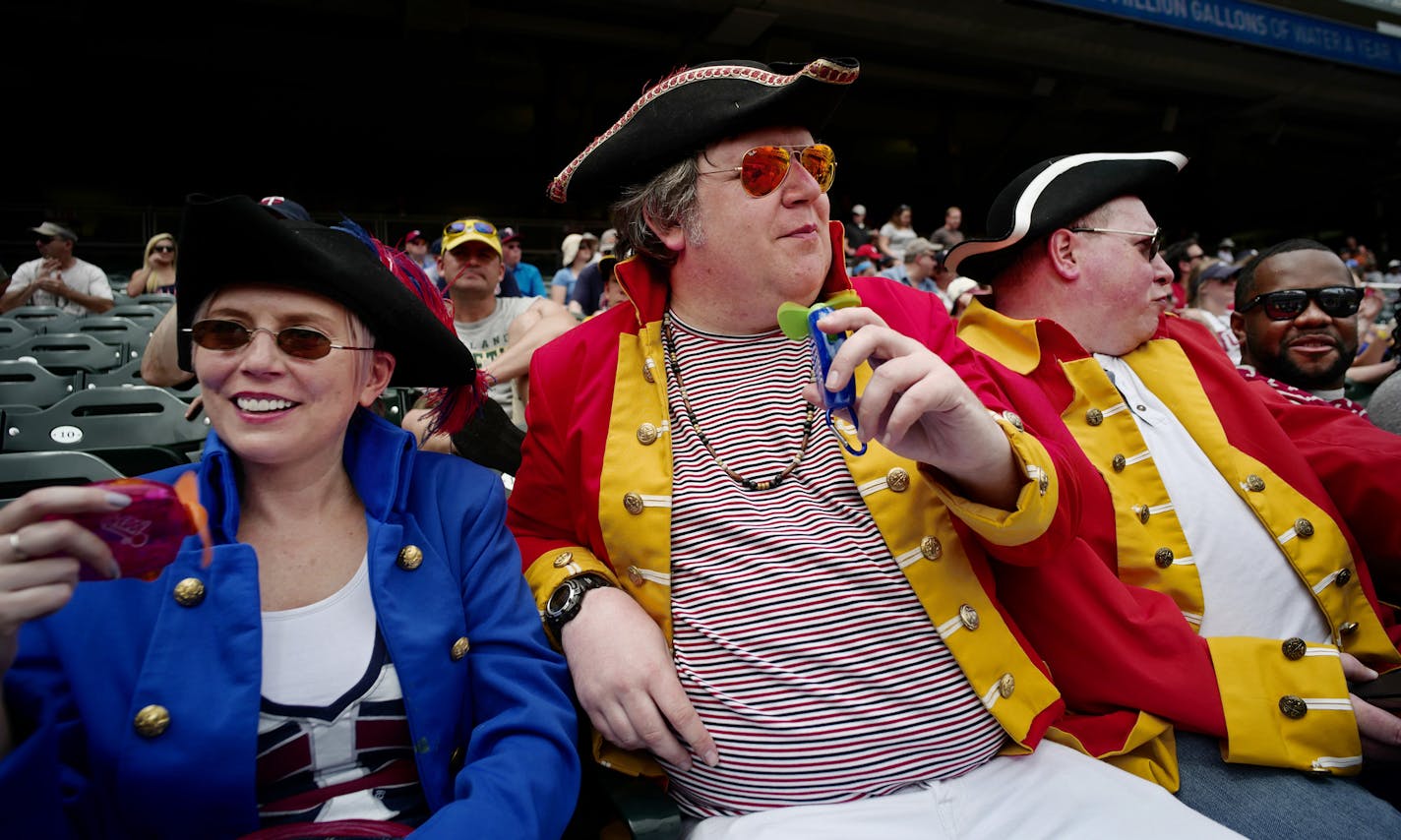 Beez McKeever enjoyed the game with "Red Coats" friends Ian and Darren Scott, brothers who are actually from Wales. They tried to stay cool and enjoyed some hot dogs earlier, a few of the estimated 150 million to be consumed today.[At the Twins game against the A's at Target Field on 7/04/16. Richard Tsong-taatarii@startribune.com