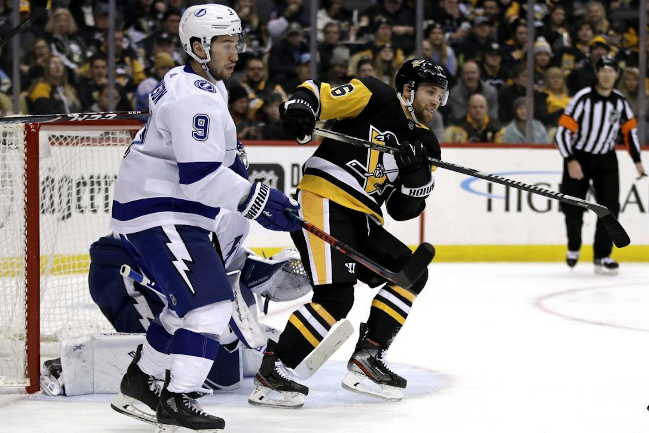 Jason Zucker (16) screens Tampa Bay Lightning goaltender Andrei Vasilevskiy with Tyler Johnson (9) defending during the second period.