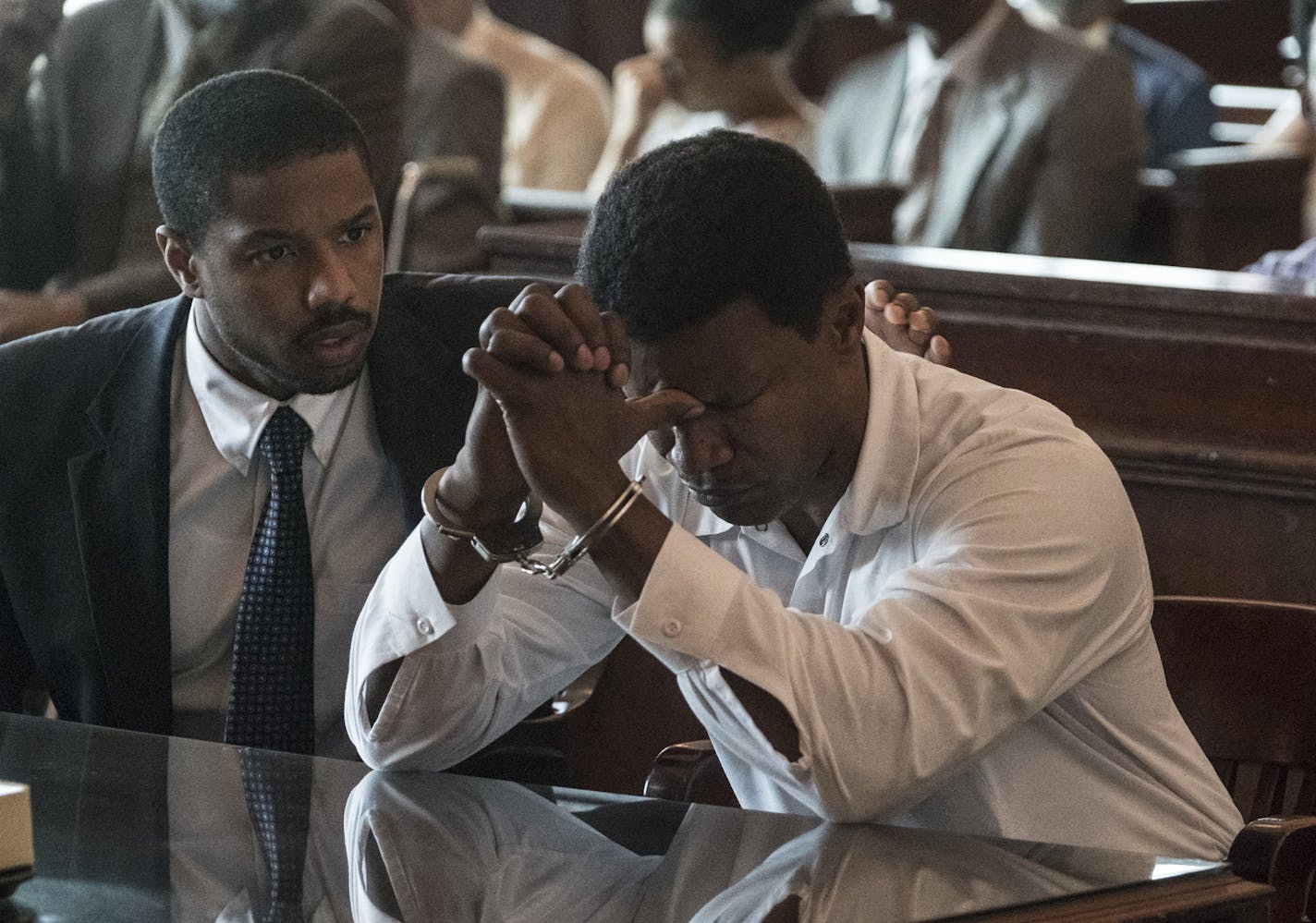 Michael B. Jordan, left, and Jamie Foxx in "Just Mercy." (Jake Giles Netter/Warner Bros. Pictures) ORG XMIT: 1524473