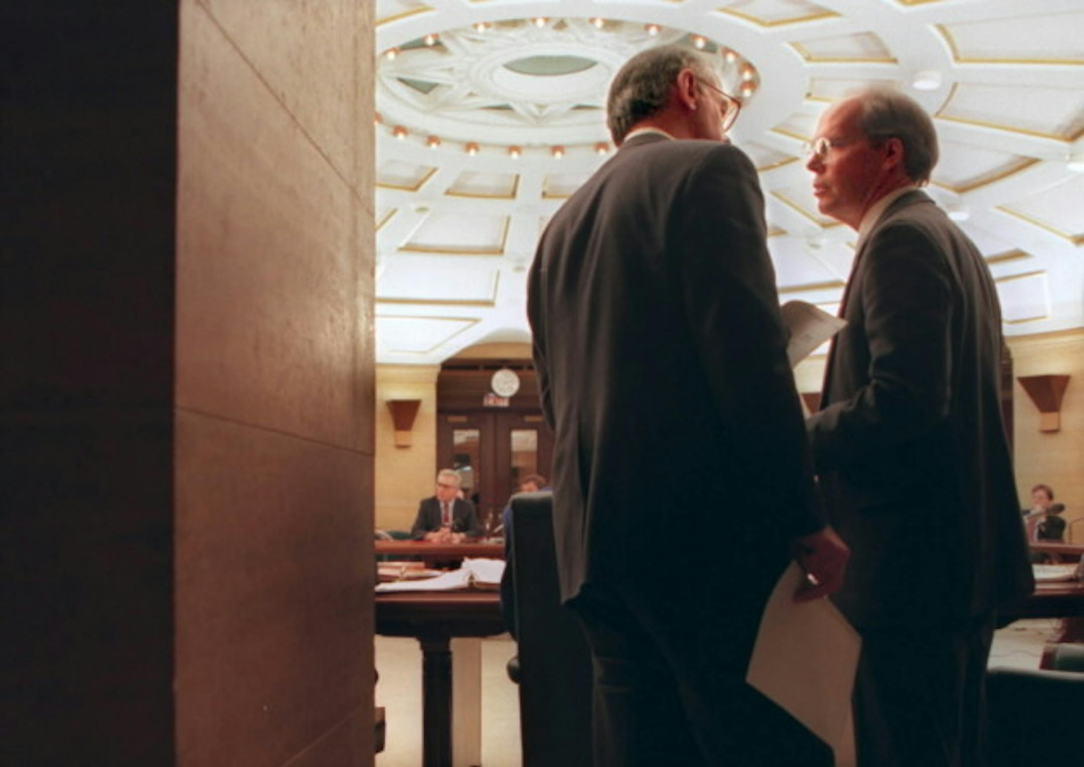 Peter Wattson offering advice to one of the many lawmakers he advised over the years