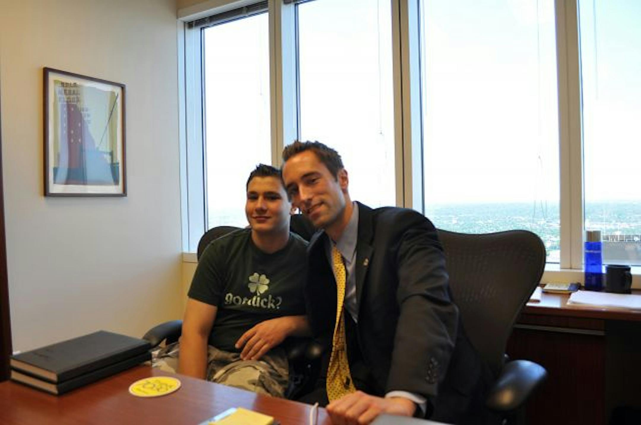 Bolder Options mentor Bill Richards and Chris Vargas, 13, of St. Louis Park visited Richards' office at Bank of America's Minneapolis wealth management office. Vargas says that by exercising more and eating less junk food, he lost 10 pounds and just had his best year of school.