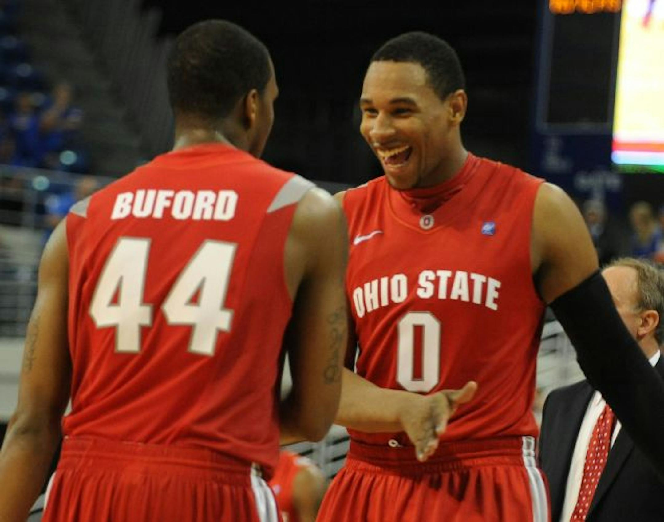 Ohio State guard William Buford (44) and Ohio State forward Jared Sullinger (0) congratulate each other on the 93-75 win over Florida during NCAA college basketball play in Gainesville, Fla., Tuesday, Nov. 16, 2010.