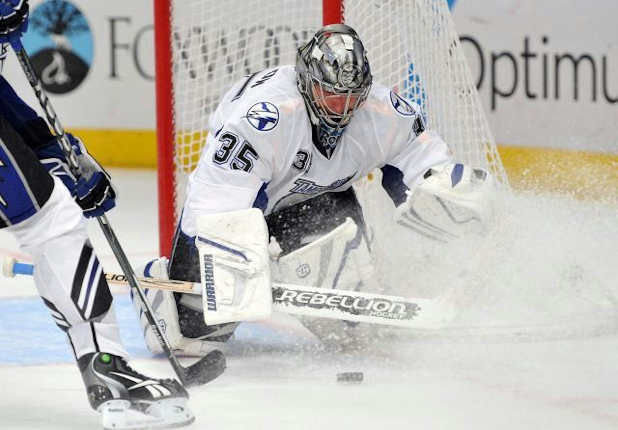 Tampa Bay Lightning goalie Dwayne Roloson (35) makes a save during the third period against the New York Rangers at Madison Square Garden in New York City, Sunday, February 27, 2011. The Lightning defeated the Rangers 2-1.