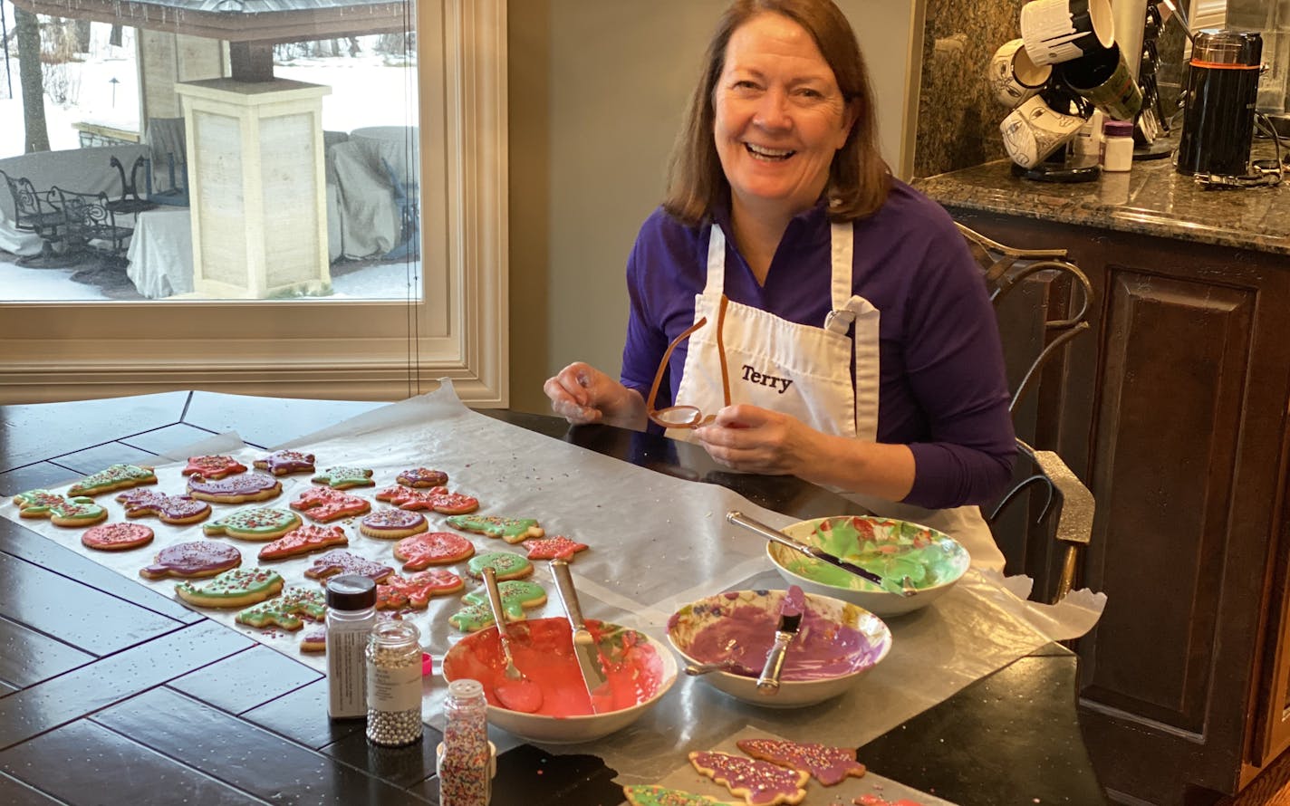 Thrivent CEO Terry Rasmussen making her annual batch of 200 sugar cookies. Rasmussen said she is determined to keep giving employees annual holiday gifts and making sure there are treats that brighten the season. Provided by Terry Rasmussen.