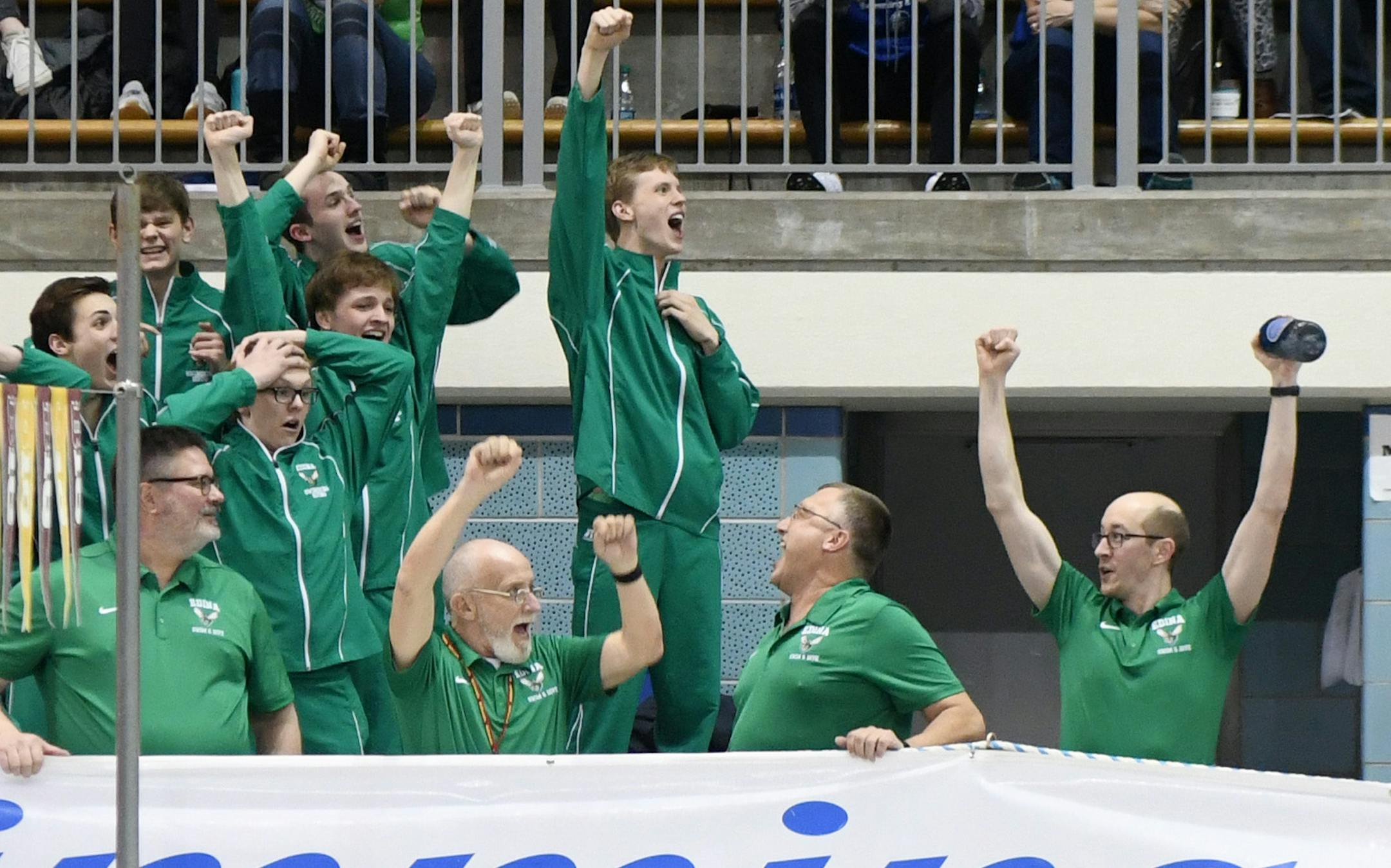 Edina swimmers and coaches cheered during the 400 freestyle relay. The Hornets won the last event of the meet.