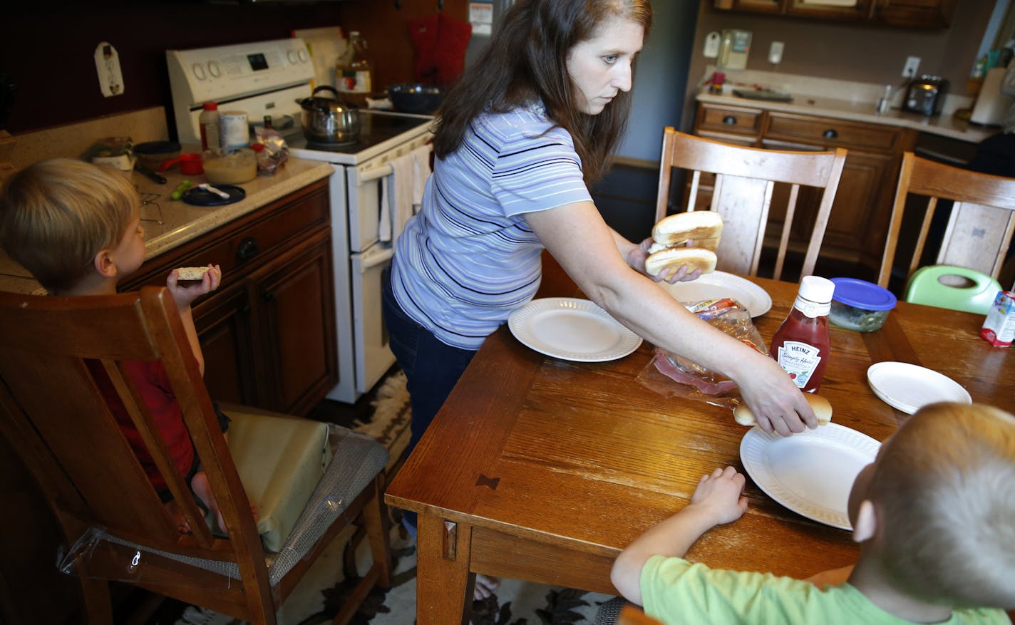 At their home in Blaine, Amy and Daron Cox are family who were in a high-risk pool and were part of MCHA . They have two boys with autism, the older one is considered recovered.]tsong-taataarii@startribune.com