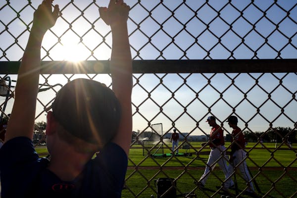 A young fan watched batting practice Friday evening.