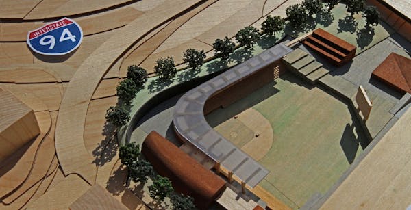 A model of a proposed new ball park for the St. Paul Saints was on display during a wiffle ball game held by the Saints on the Capitol lawn in support