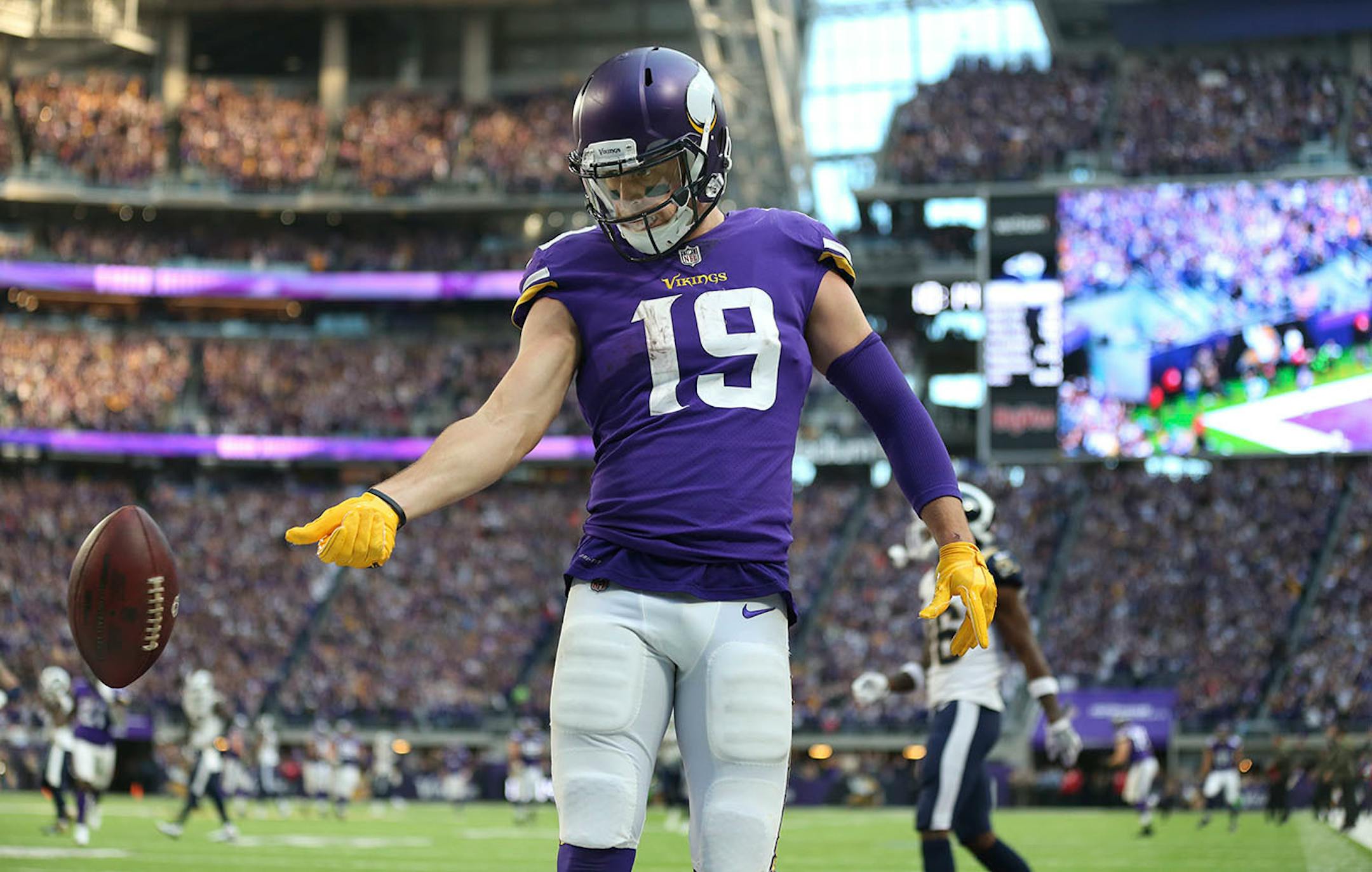 Minnesota Vikings wide receiver Adam Thielen (19) flipped the ball after scoring on a 65 yard catch in the fourth quarter at U.S. Bank Stadium Sunday November 19, 2017 in Minneapolis, MN.