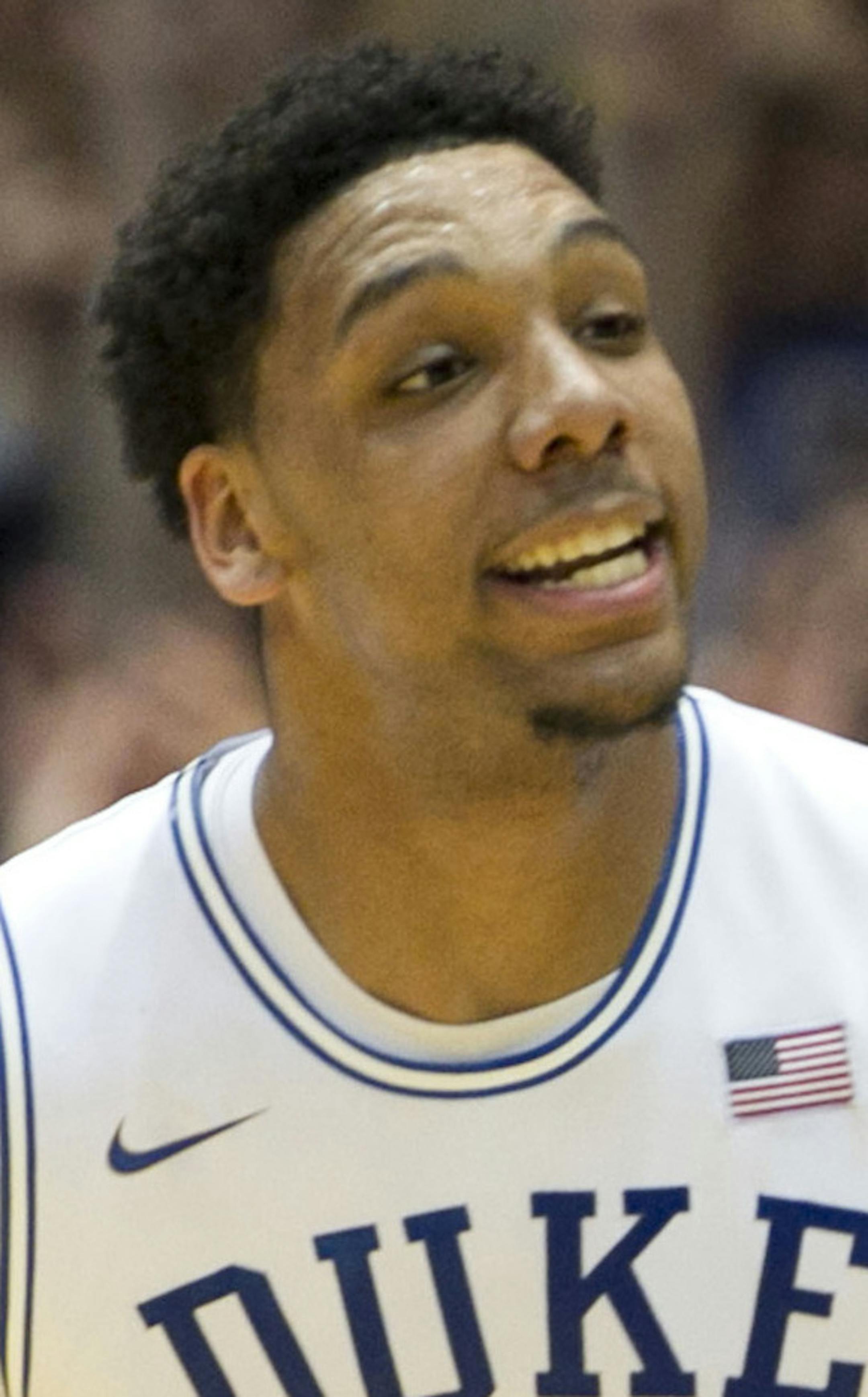 Duke's Jahlil Okafor (15) reacts after a basket during the first half against North Carolina at Cameron Indoor Stadium in Durham, N.C., on Wednesday, Feb. 18, 2015. Duke won in overtime, 92-90. (Robert Willett/Raleigh News & Observer/TNS)