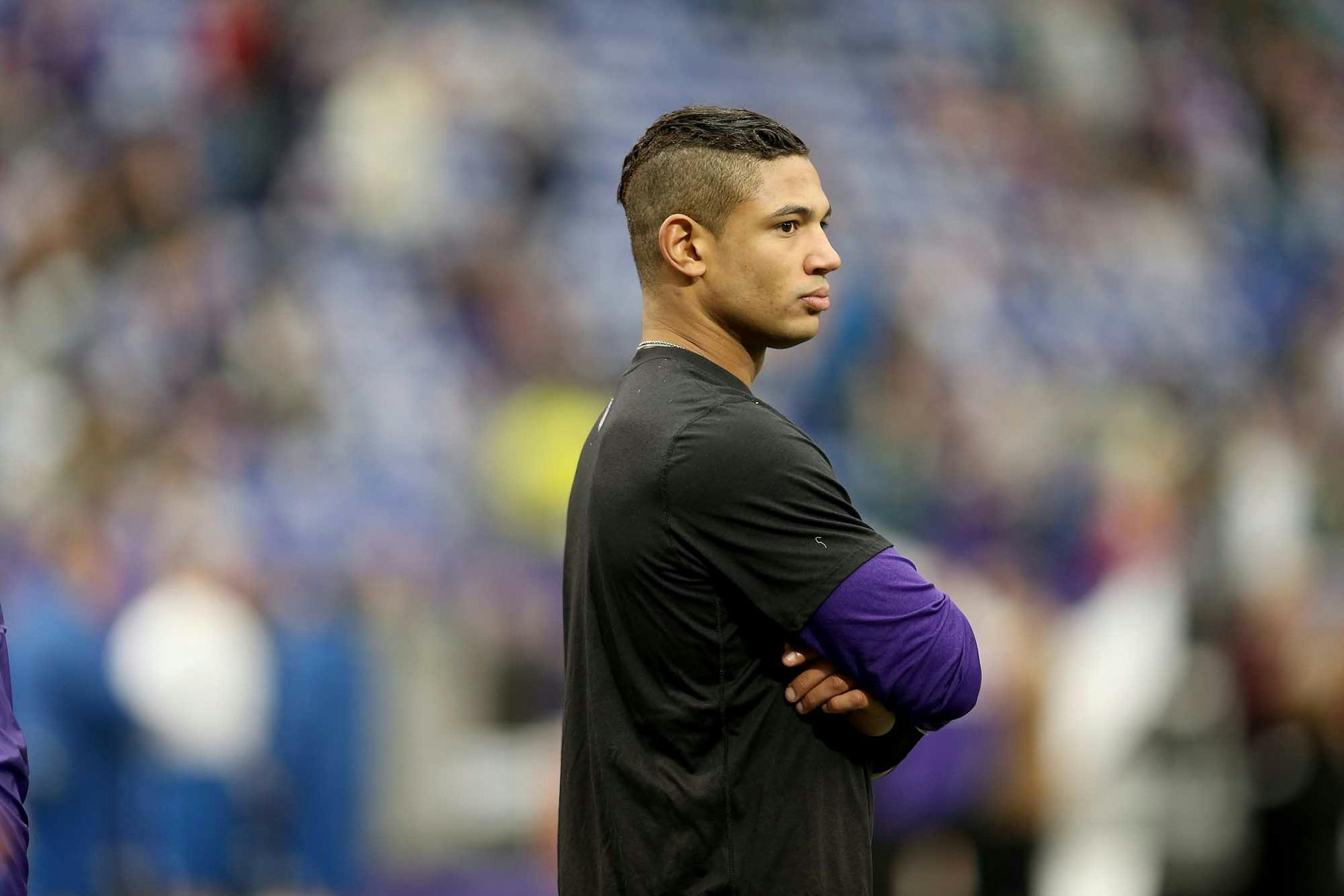 Minnesota Vikings Josh Freeman watched his teammates before the game at Mall of America Field, Sunday, December 15, 2013.