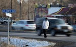 A pedestrian waited for an opportunity to cross busy State Highway 10 in Anoka at Verndale Ave near the location where Hannah Craft, 16, was killed Mo