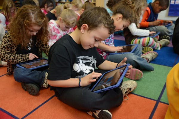 Kindergarten students at Royal Oaks Elementary School in Woodbury have begun using iPads in the classroom. Barbara Brown, a district spokeswoman, said