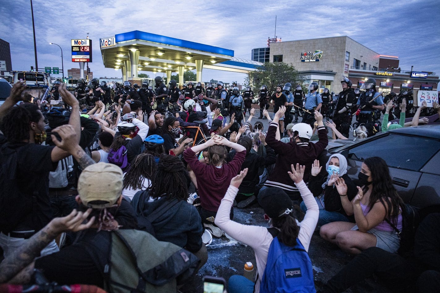 Police arrested about 150 protesters Sunday night at Bobby and Steve's gas station near Washington Avenue and Hwy. 35W.