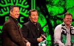 Matthew McConaughey, center, jokes as Dell President and Chief Commercial Officer Marius Haas, left, and Austin FC CEO Anthony Precourt laugh during a