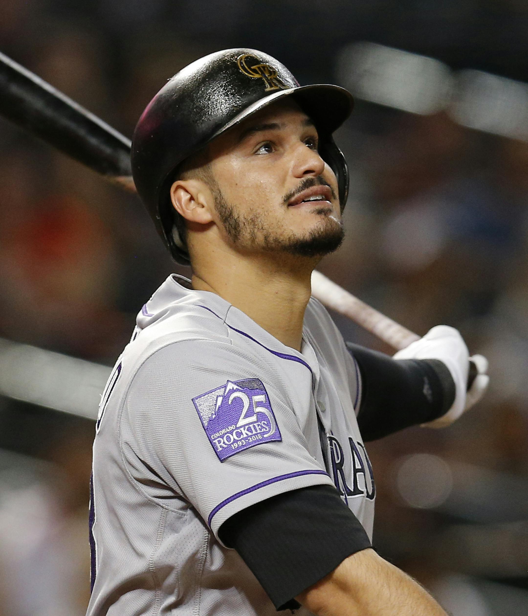 Colorado Rockies third baseman Nolan Arenado (28) in the first inning during a baseball game against the Arizona Diamondbacks, Saturday, Sept. 22, 2018, in Phoenix. (AP Photo/Rick Scuteri) ORG XMIT: MIN2018092420383838