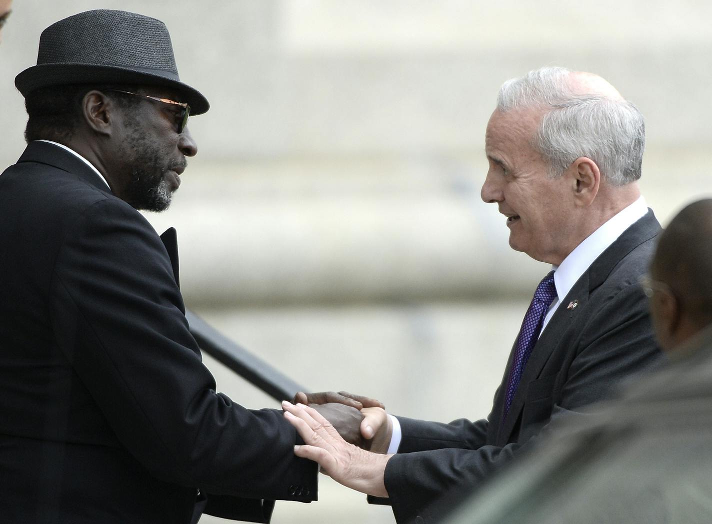 Minnesota Governor Mark Dayton greeted funeral goers upon his arrival at the St. Paul Cathedral Thursday. ] (AARON LAVINSKY/STAR TRIBUNE) aaron.lavinsky@startribune.com The funeral for Philando Castile was held Thursday, July 14, 2016 at St. Paul Cathedral in St. Paul, Minn.