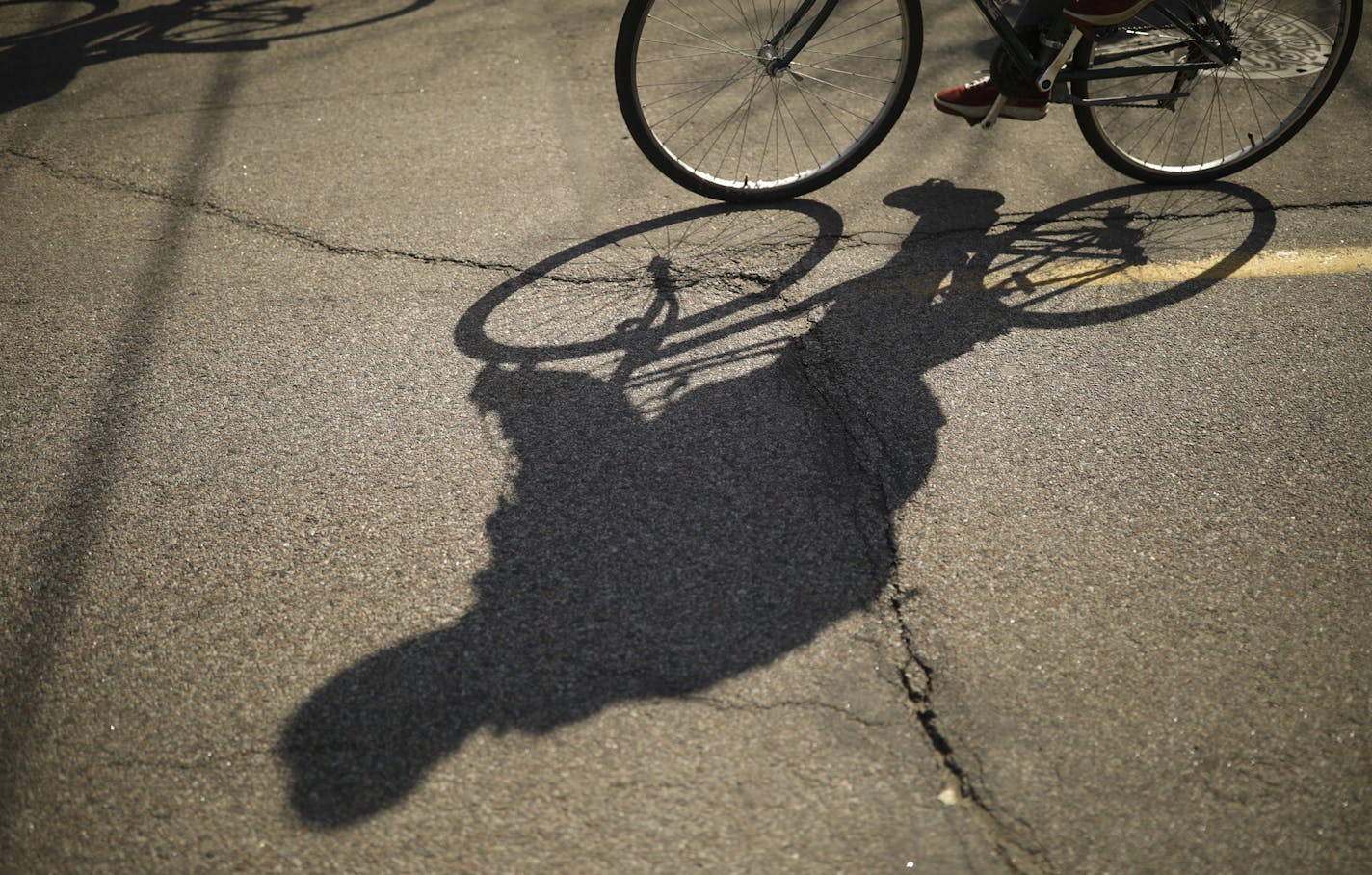 Riders' shadows on 40th St. as they set out from Farmstead Bike Shop Sunday afternoon. ] JEFF WHEELER &#x2022; jeff.wheeler@startribune.com The Farmstead Bike Shop hosted a family-friendly Ice Cream Ride from their shop at 40th St. and Bryant Ave. S. to kick off 30 Days of Biking Sunday afternoon, April 1, 2018 in Minneapolis. The shop will hold similar rides at least one Sunday each month through the summer and probably into September, said co-owner Greg Neis.