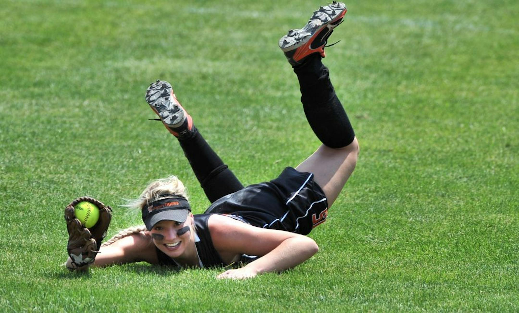Cherry Tigers Angel Dahl came up with a sliding catch. Cherry won the 1A title against Blooming Prairie 2 to 1, Friday, June 8, 2012