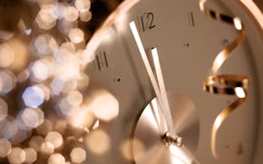 clock before midnight on new years eve. istock