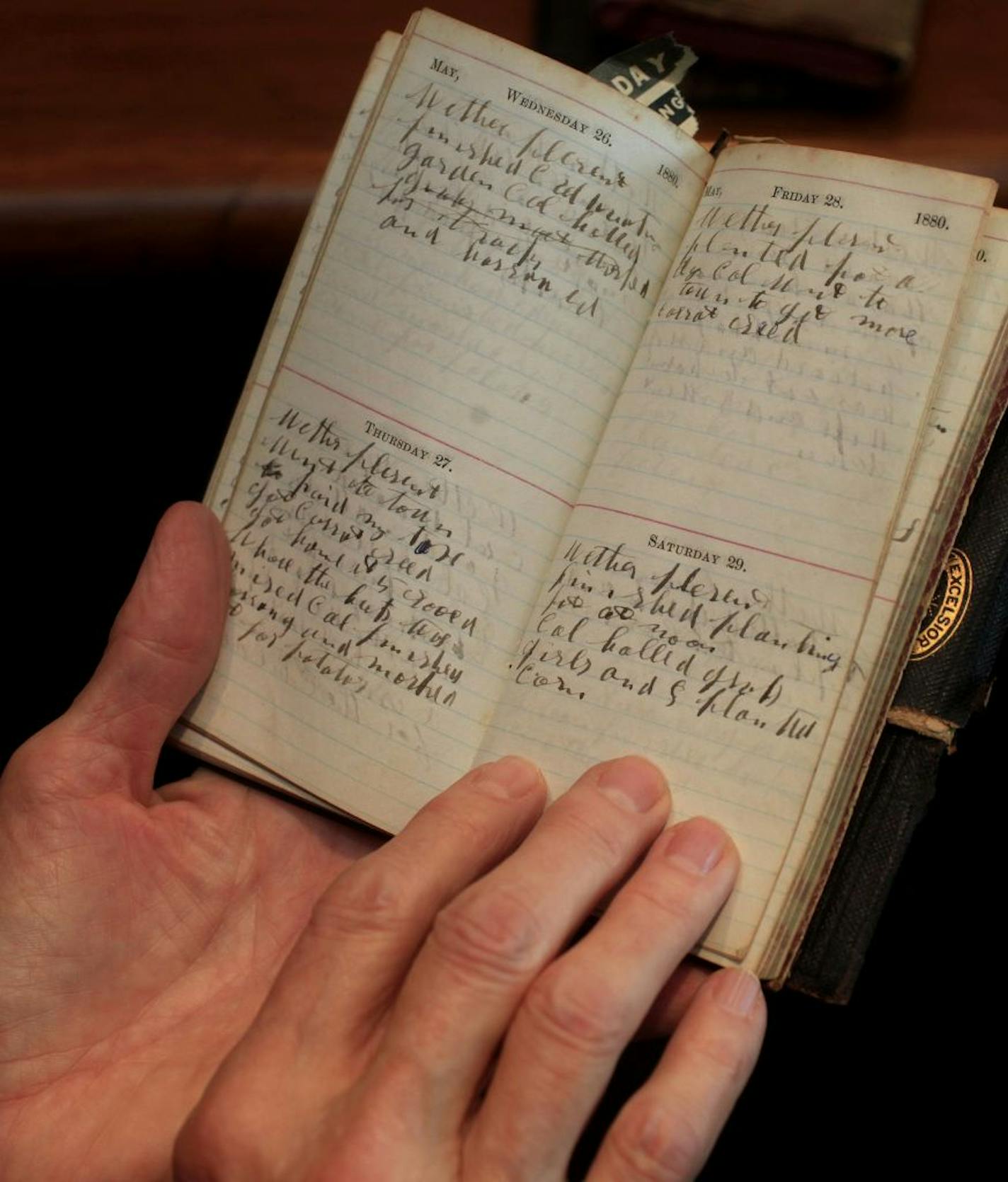 B.C. Yancey, left four tattered, leather-bound diaries to the Edina Historical Society. Yancey and his wife, Ellen, played a big role in the village, serving on the village council and setting up the local grange and PTA. Yet a few years later, Yancey's descendants and many of the other black pioneers were gone. Now volunteer Martha Johnson is transcribing Yancey's cramped diary writings. Edina, MN on December 11, 2012.