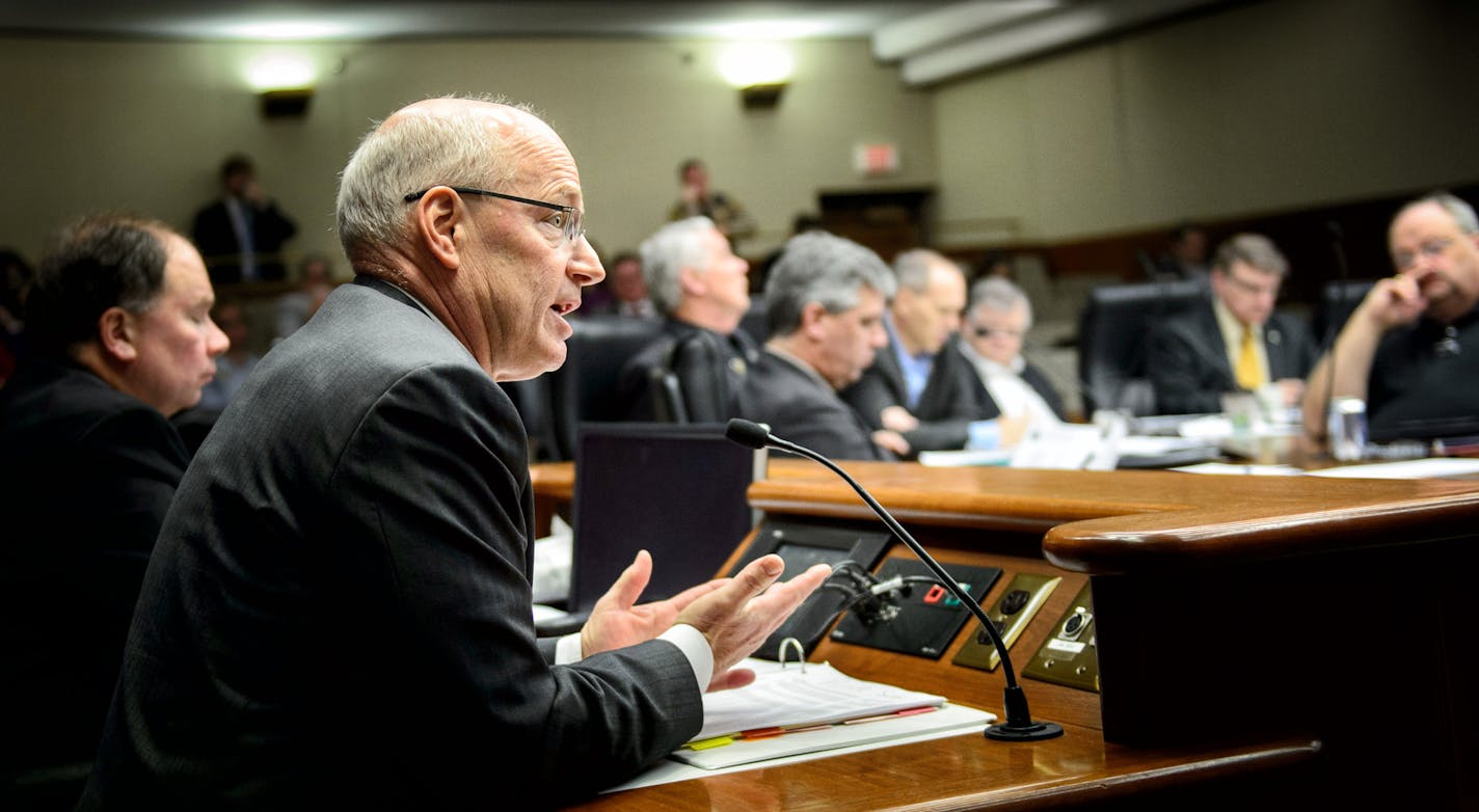 Minnesota Management and Budget Commissioner Myron Frans faced tough questioning at the House Ways and Means Committee hearing about Governor Dayton's raises for commissioners. Committee Chairman Rep. Jim Knoblach, left, sat next to him. The committee eventually approved an amendment that would reduce deficiency funding for state agencies by the amount of the raises approved for the commissioners of those agencies. ] GLEN STUBBE * gstubbe@startribune.com Monday, February 9, 2015