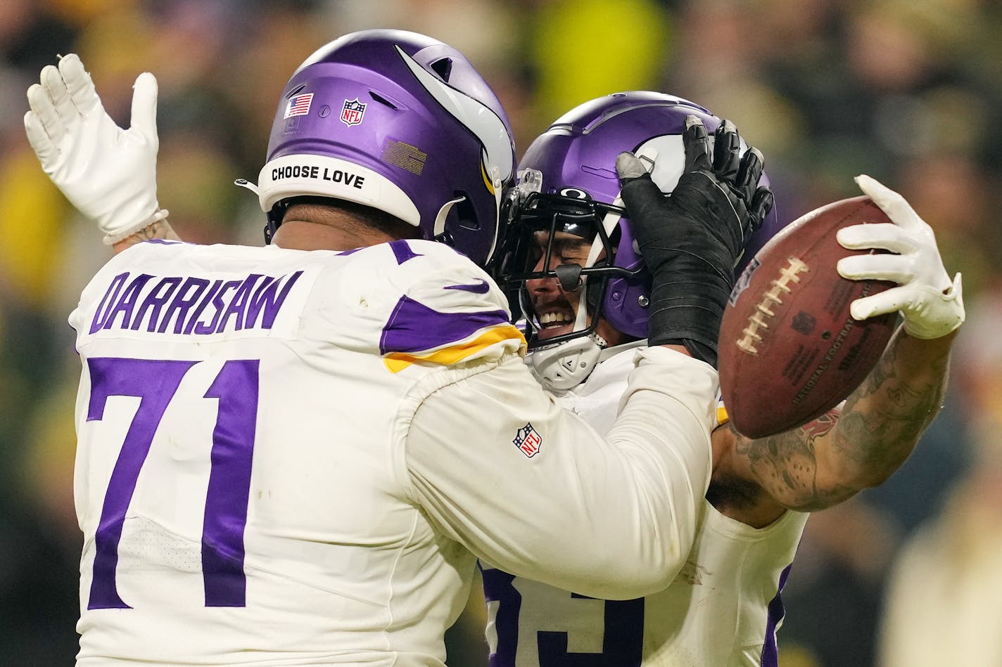 Minnesota Vikings wide receiver Jalen Nailor (83) celebrates with offensive tackle Christian Darrisaw (71) after scoring a touchdown in the fourth quarter of an NFL game between the Minnesota Vikings and the Green Bay Packers Sunday, Jan. 1, 2023 at Lambeau Field in Green Bay . ] ANTHONY SOUFFLE • anthony.souffle@startribune.com