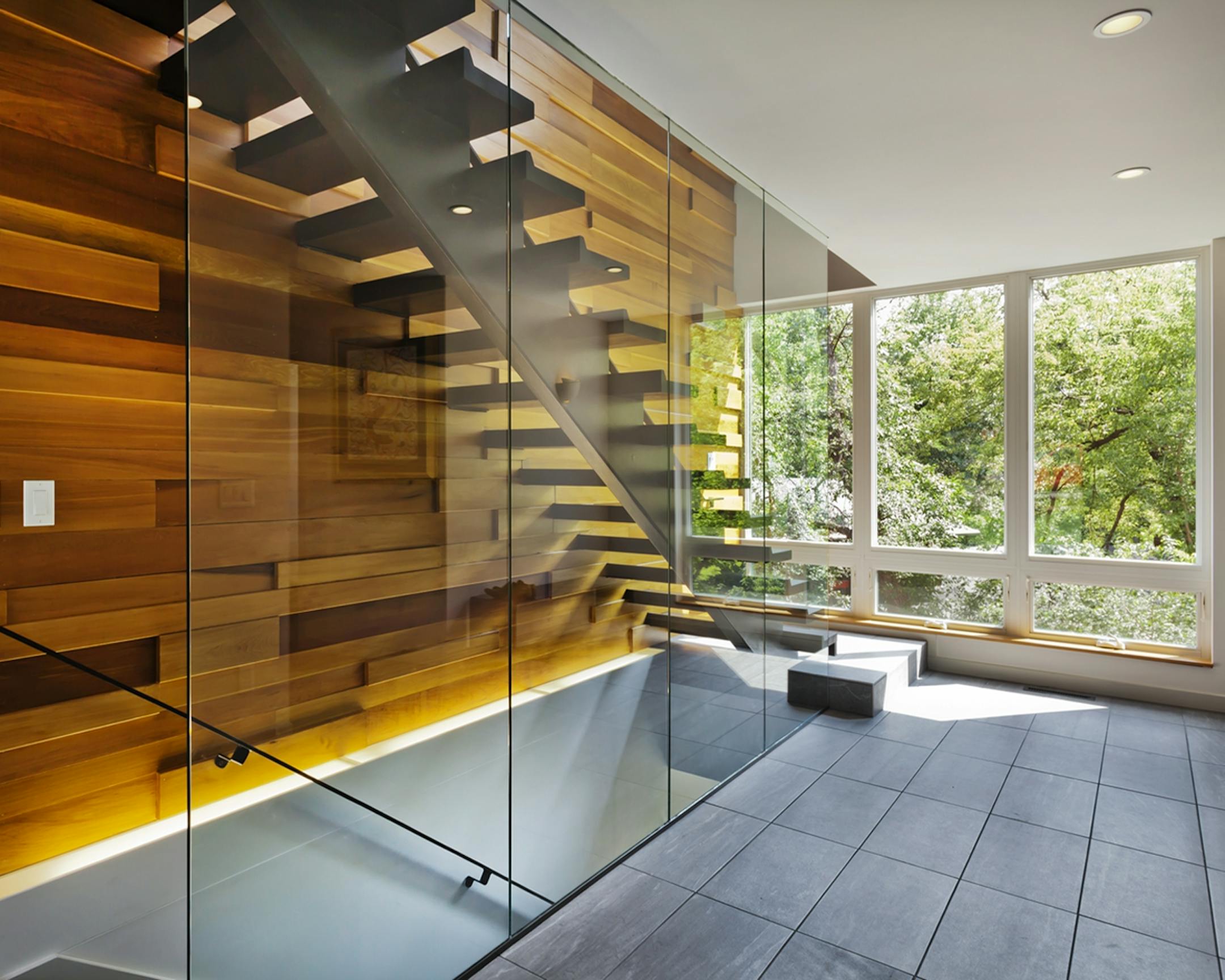 Home of the Month: RoehrSchmitt Architecture translated the best features of a family's downtown loft into a new modern home . Credit Gilbertson Photography