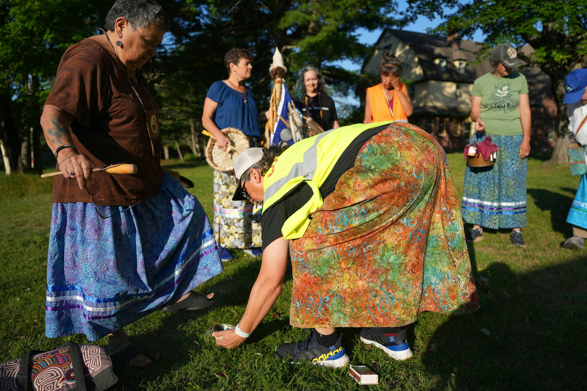 Core walker Chas Jewett smudges Sharon Day during a morning ceremony before the day's walk.