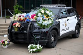 A May 31 memorial for Minneapolis police officer Jamal Mitchell outside the Fifth Precinct.