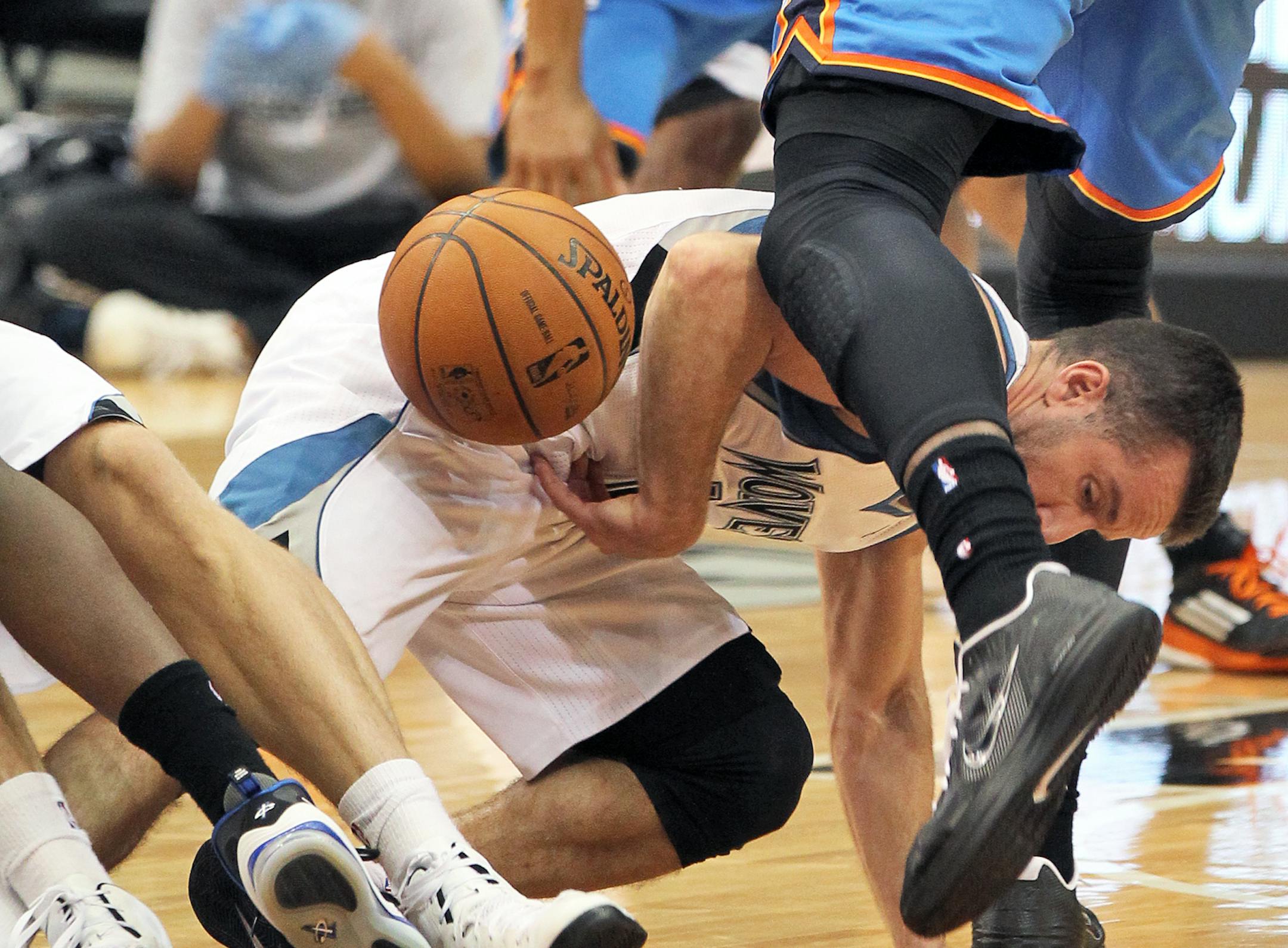 Minnesota Timberwolves vs. Oklahoma City Thunder. Wolves J.J. Barea dove to the floor for a lose ball