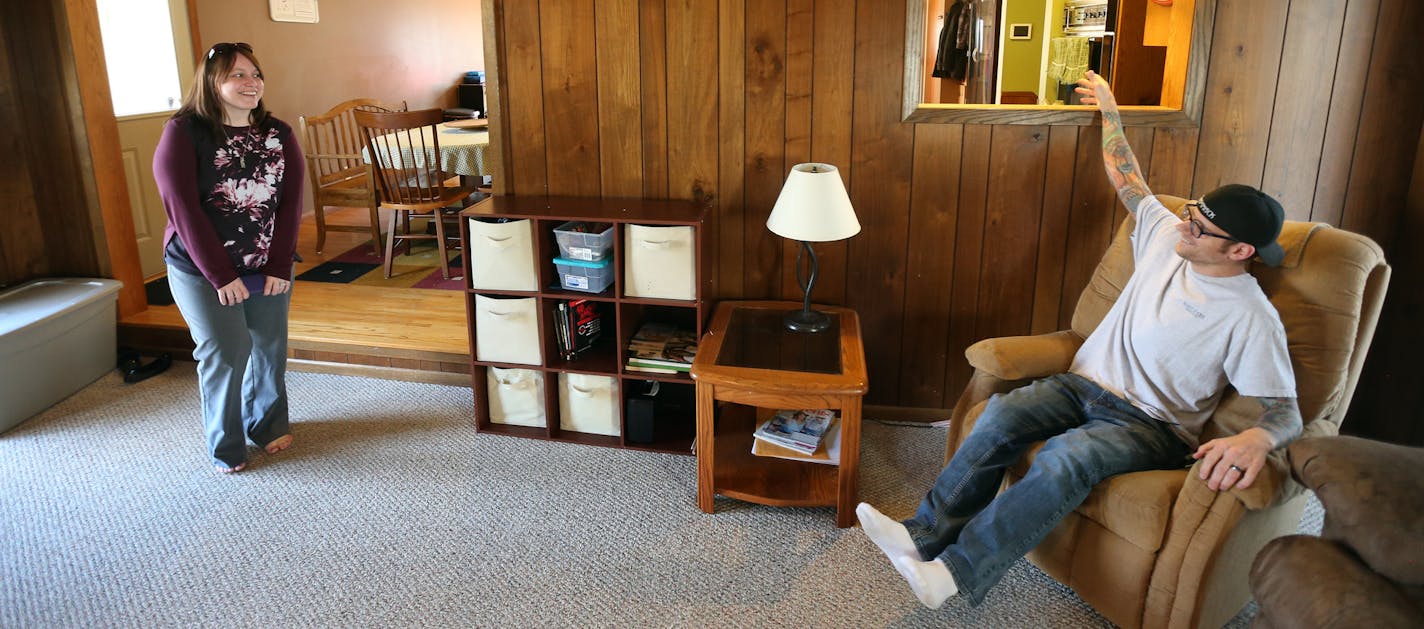 Bonnie Blekestad left and her husband James Blekestad stood in the family room during an inspection of a house that they are buying on Eldorado Street Tuesday March 8, 2016 in Coon Rapids, MN. ] Jerry Holt/Jerry.Holt@Startribune.com