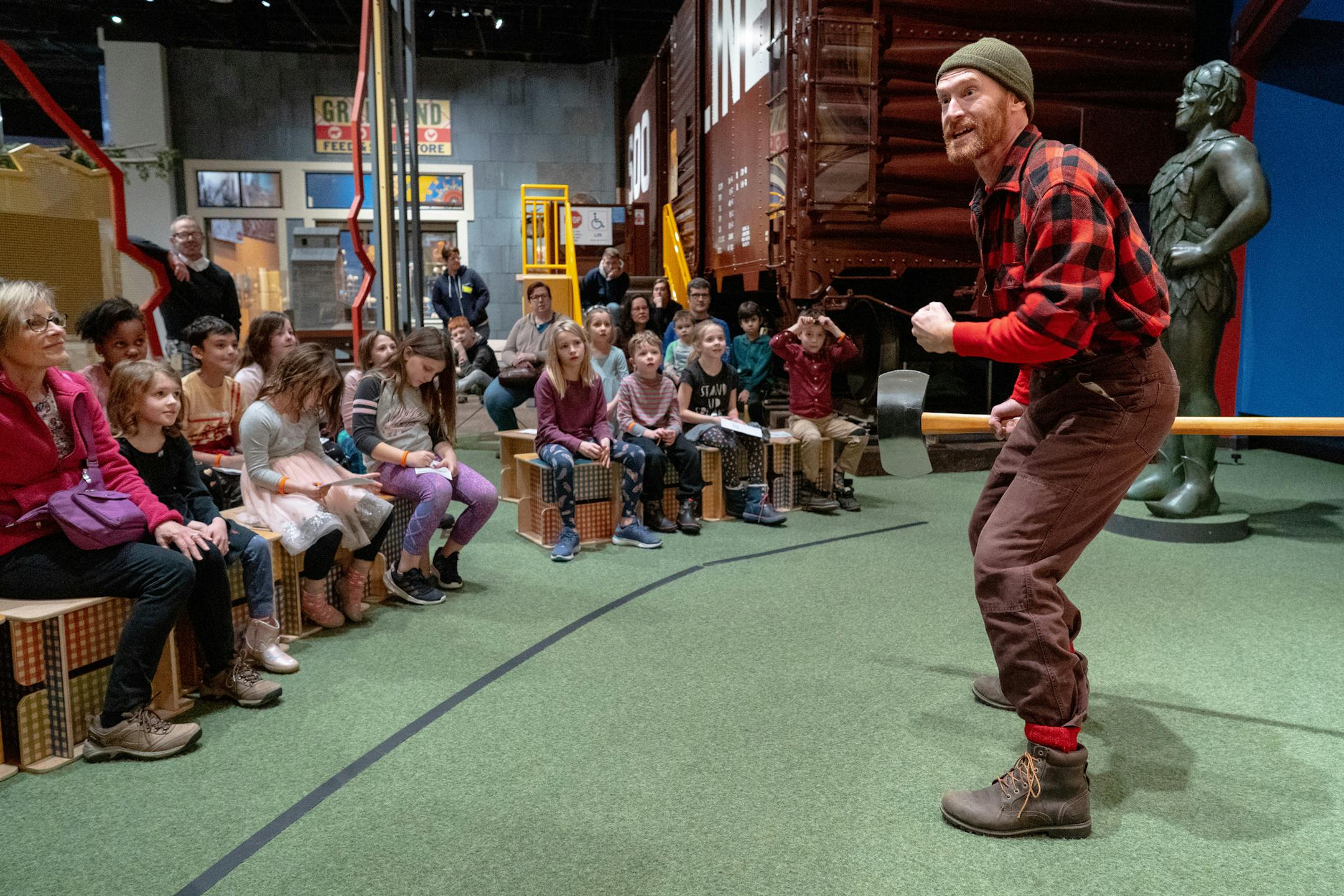 Paul Bunyan regaled young visitors with larger-than-life stories from his days logging in Minnesota's great north woods. ] MARK VANCLEAVE ¥ The Minnesota History Center is celebrating winter in Northwoods with History Hound Hijinx with special activities for kids through Monday. Photographed Friday, Dec. 28, 2018.