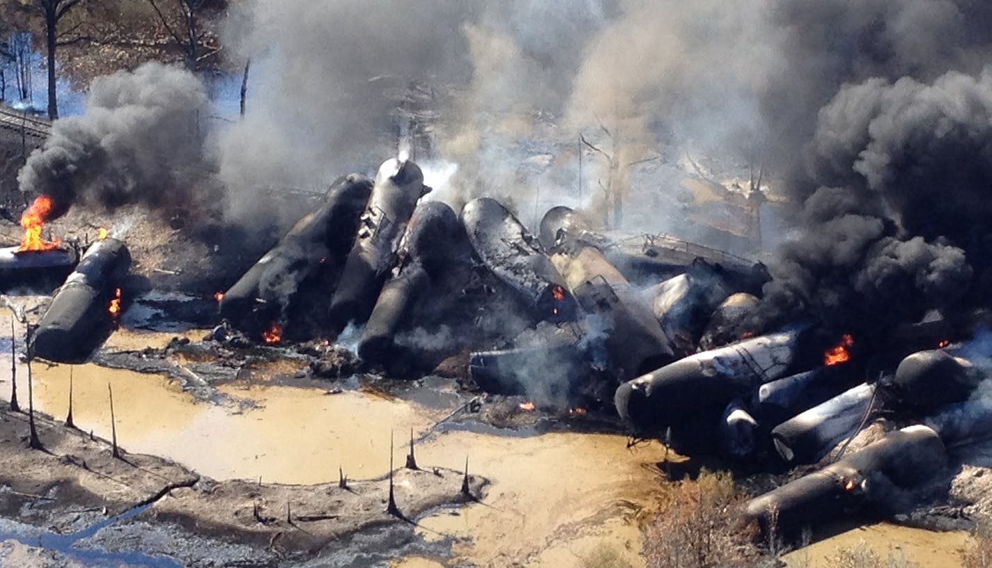 A tanker train carrying crude oil burns after derailing outside Aliceville, Ala., early Friday, Nov. 8, 2013.