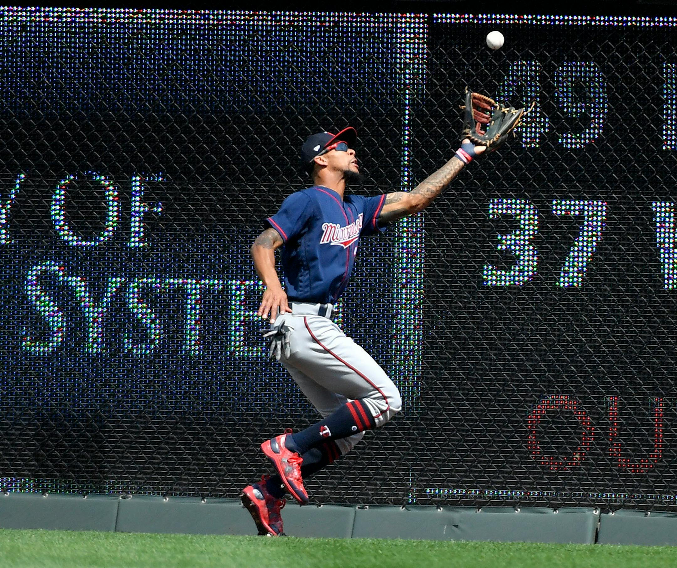 Minnesota Twins center fielder Byron Buxton runs down an out on Kansas City Royals' Salvador Perez to end the second inning on Sunday, Sept. 10, 2017 at Kauffman Stadium in Kansas City, Mo.