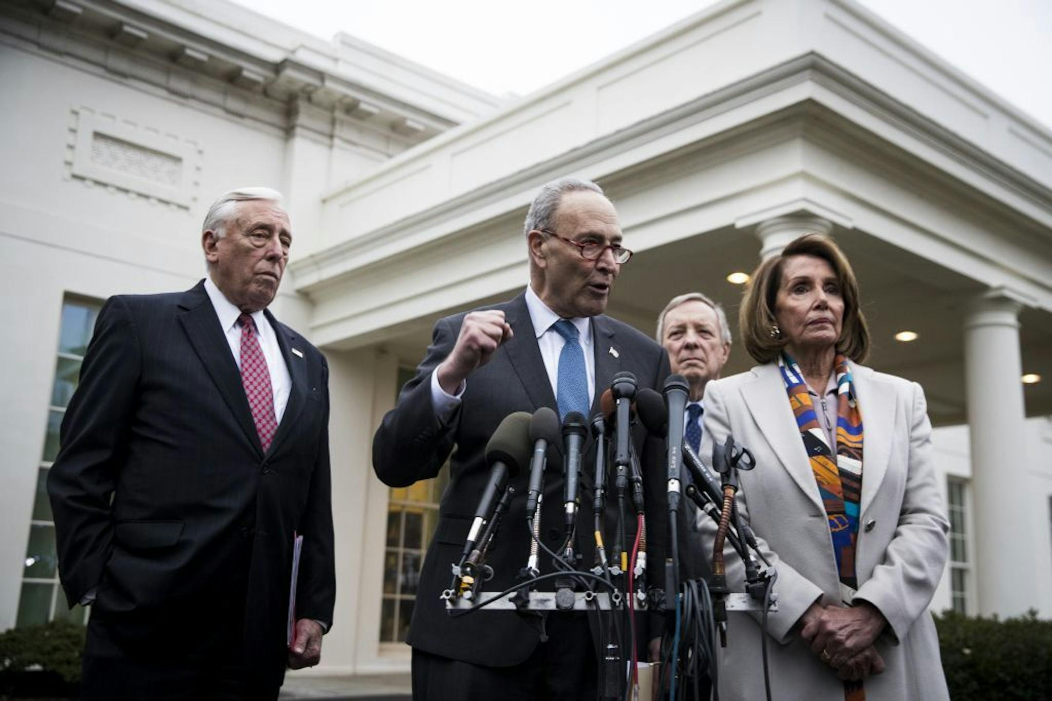 Senate Minority Leader Chuck Schumer (D-N.Y.) and Democratic congressional leaders speak outside the White House in Washington after a meeting with President Donald Trump, Jan. 2, 2019. The closed-door meeting yielded no agreement on a way to break an impasse over Trump's demands for billions of dollars in spending for a border wall. From left: Rep. Steny Hoyer (D-Md.), the incoming House Majority Leader; Schumer; Sen. Dick Durbin (D-Ill.); and House Minority Leader Nancy Pelosi (D-Calif.).