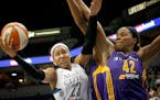 Lynx forward Maya Moore drove to the basket against Los Angeles' Jantel Lavender on July 29.