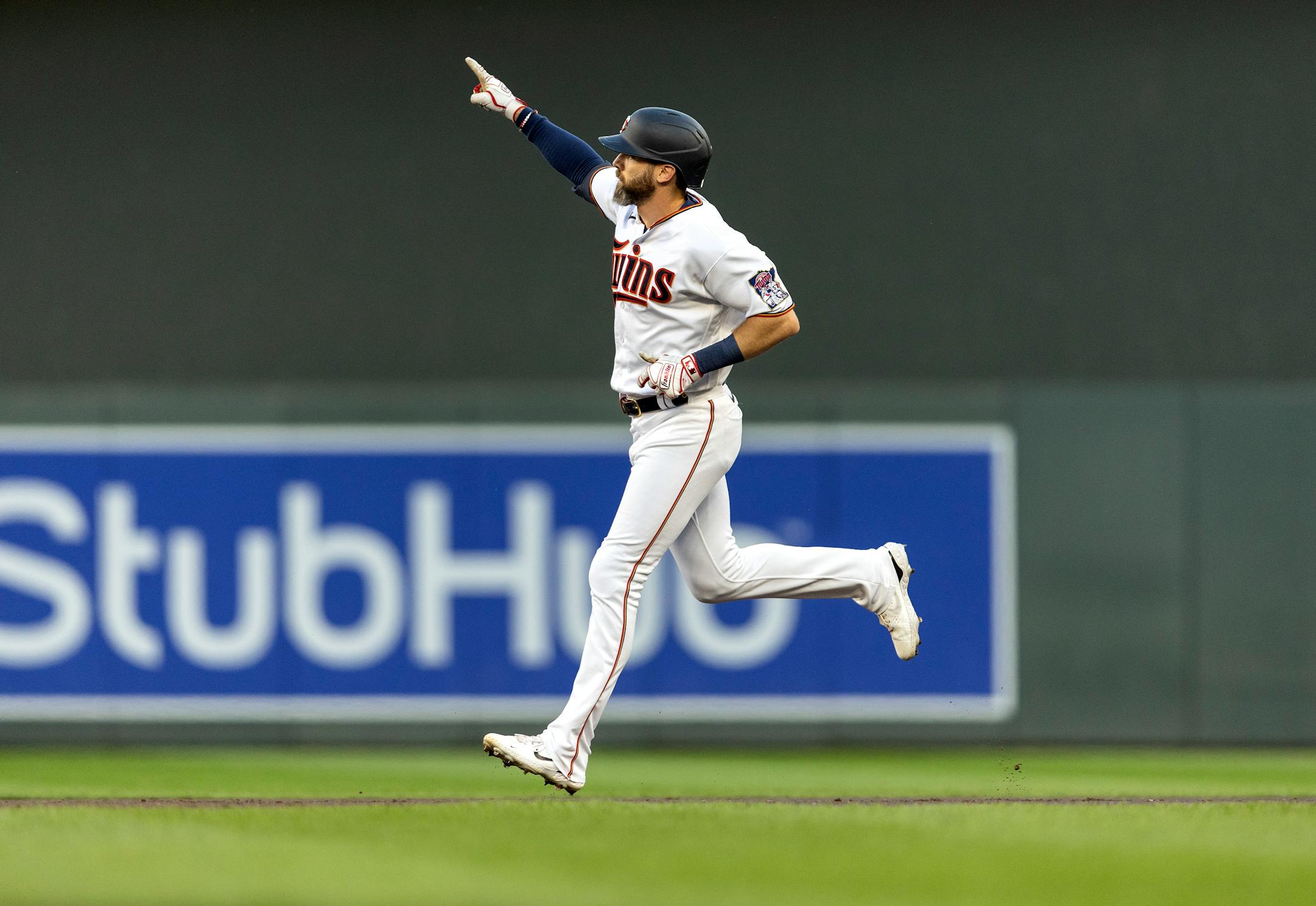 Jake Cave of the Minnesota Twins celebrates after hitting a home run in the second inning.