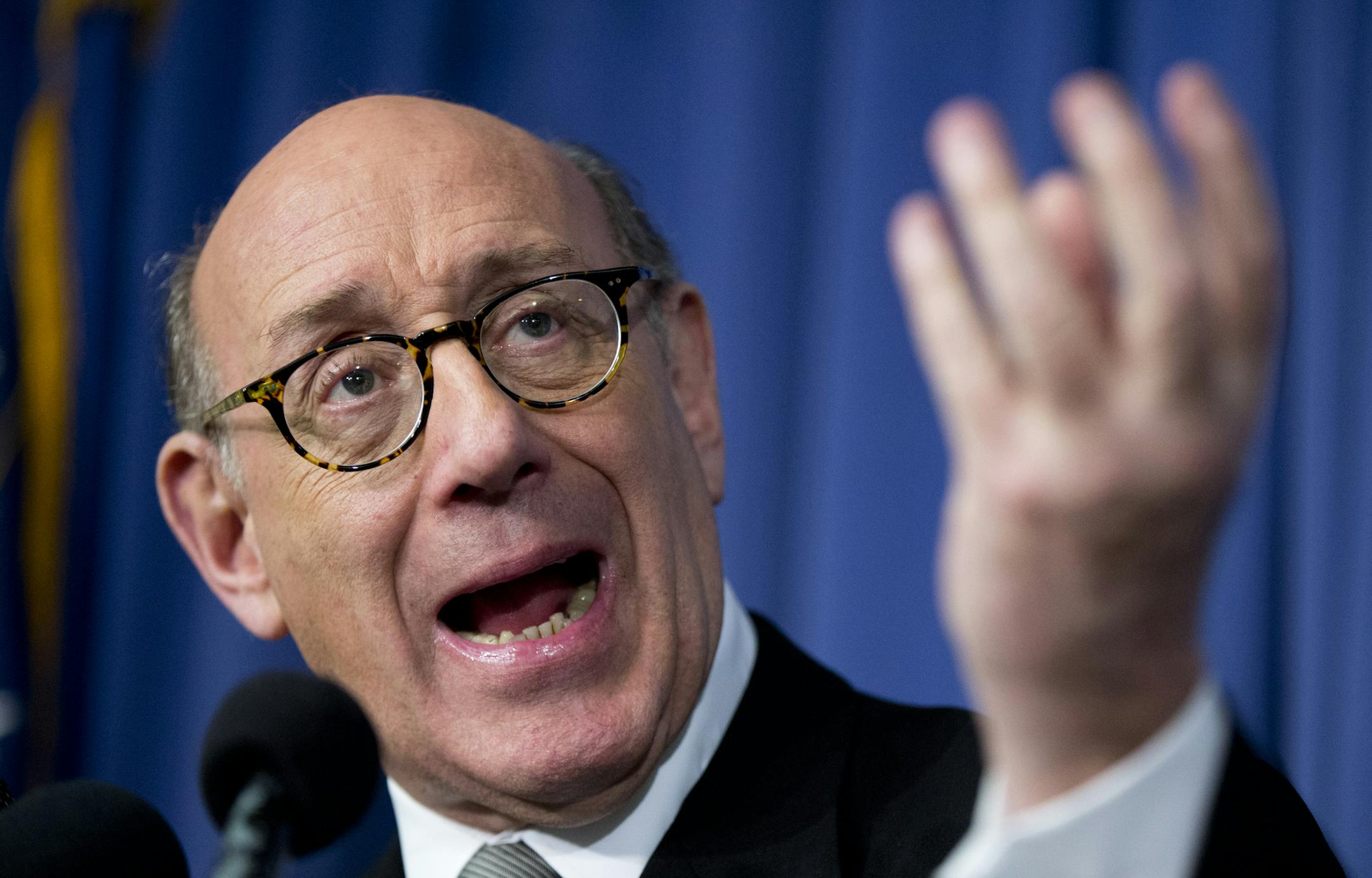 FILE - In this Monday, June 30, 2014, file photo, Kenneth Feinberg, the independent claims administrator for the General Motors Ignition Compensation Program, announces the details of the program during a news conference at the National Press Club in Washington. Feinberg said Monday, Sept. 15, 2014, that he has determined that 19 wrongful death claims, tied to faulty ignition switches in General Motors small cars, are eligible for payments from GM. General Motors’ estimate of deaths has s