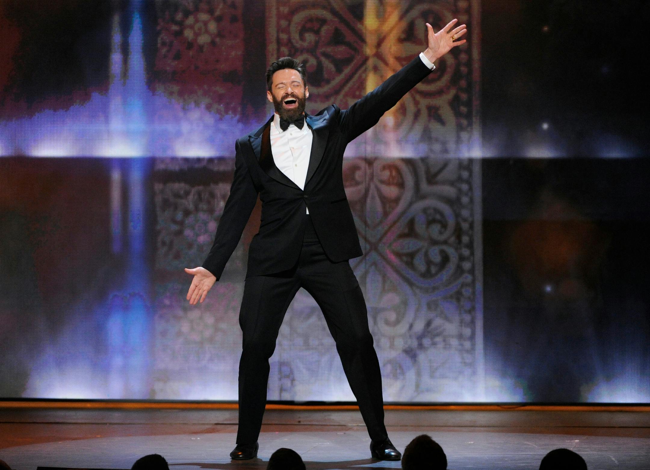 Host Hugh Jackman performs on stage at the 68th annual Tony Awards at Radio City Music Hall on Sunday, June 8, 2014, in New York. (Photo by Evan Agostini/Invision/AP)
