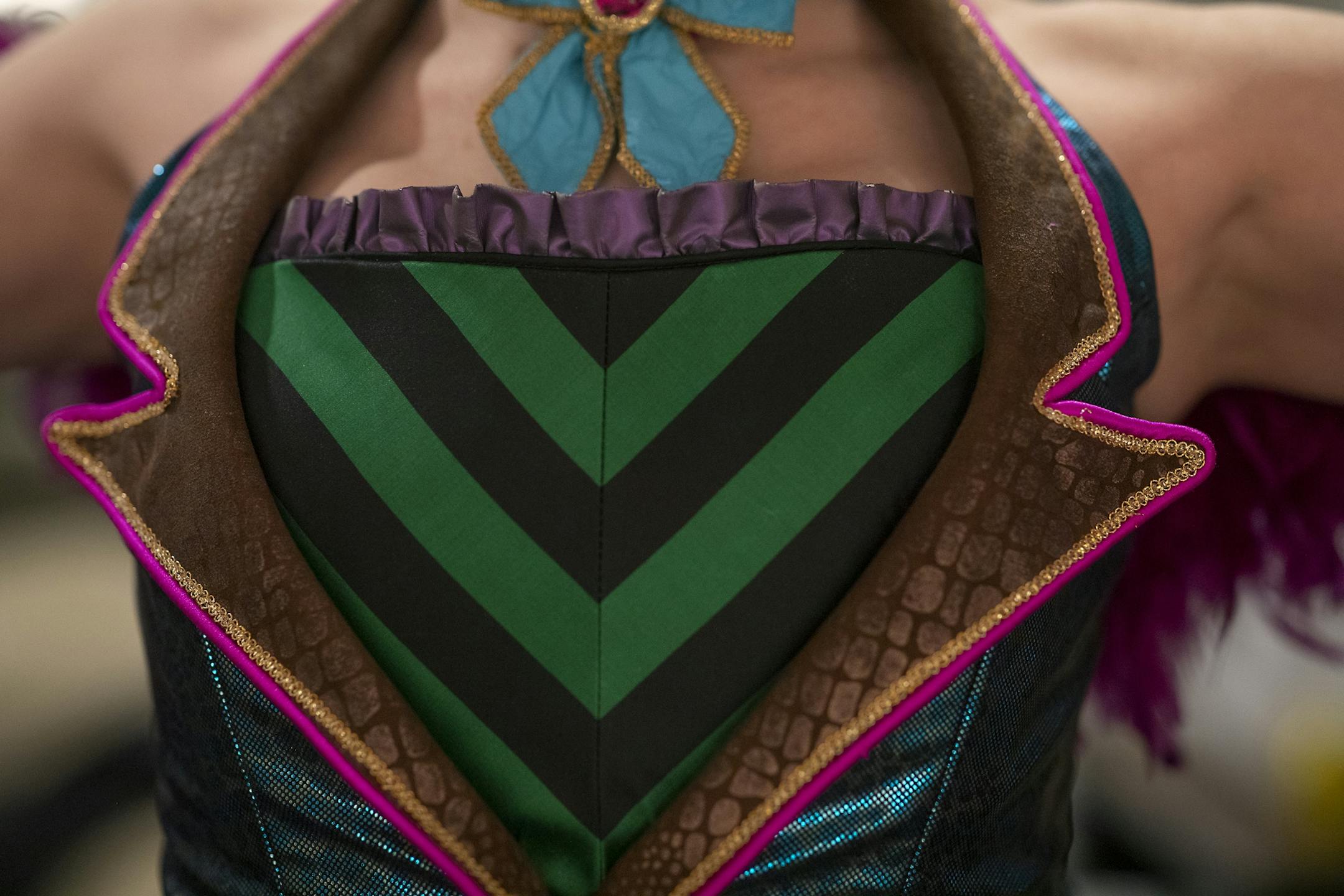 Children's Theatre Company's Andi Soehren tightened a corset onto actor Autumn Ness as they got ready in the dressing room for a dress rehearsal for the Theatre's production of "Cinderella," Friday, November 1, 2019.