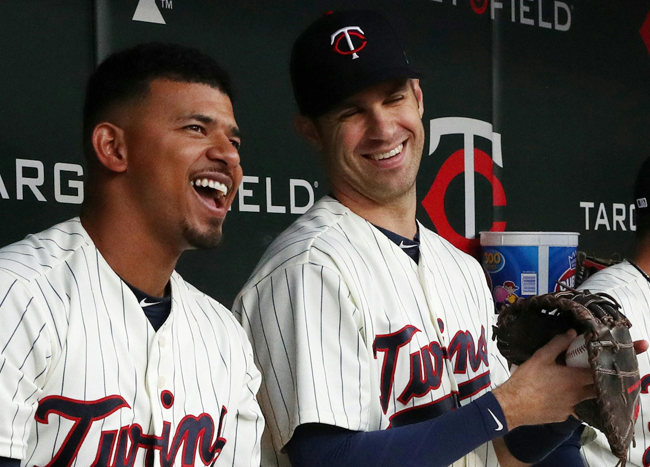 Minnesota Twins third baseman Eduardo Escobar (5) and Minnesota Twins first baseman Joe Mauer (7) shared a laugh as they watched replays on the scoreboard prior to the start of Saturday's game agains the Detroit Tigers. ] ANTHONY SOUFFLE ï anthony.souffle@startribune.com Action from an MLB game between the Minnesota Twins and the Detroit Tigers Saturday, Sept. 30, 2017 at Target Field in Minneapolis.