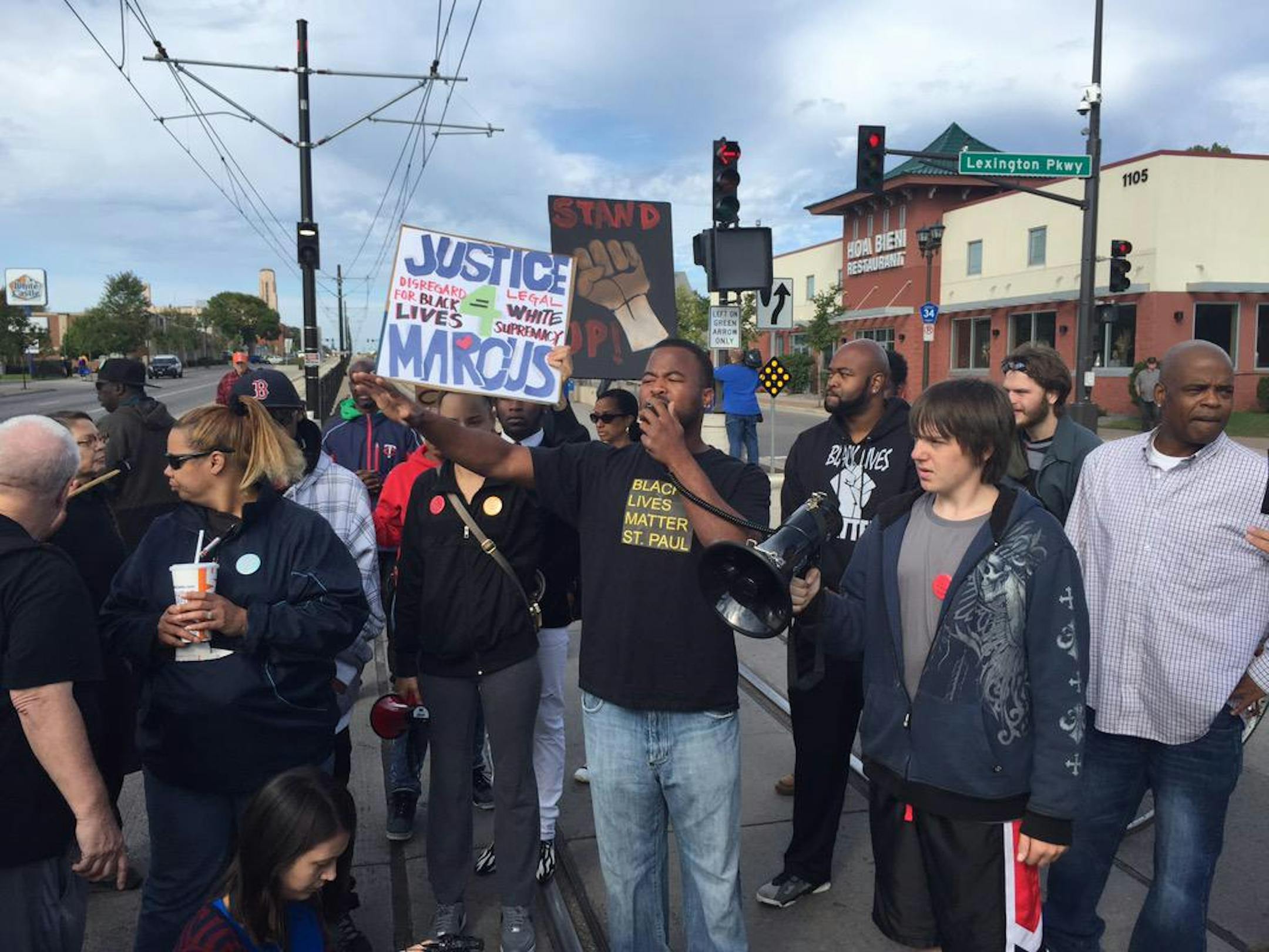 Protesters gather on the light rail tracks in St. Paul on Sunday, Sept. 20, 2015.