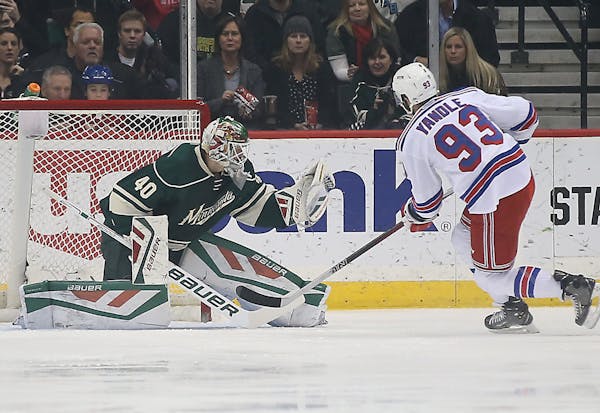 Wild goalie Devan Dubnyk made a save in the first period during a penalty shot by Rangers defenseman Keith Yandle as the Minnesota Wild took on the Ne