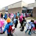 Kindergartners lined up outside Wilson Elementary School in Anoka, which took on extra kindergartners because of an overflow at Ramsey Elementary.