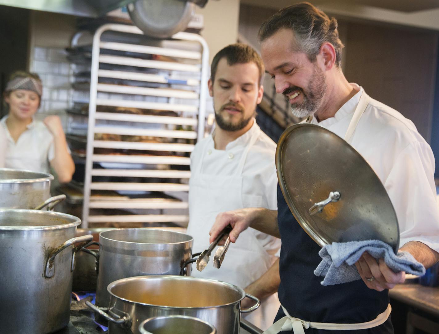 At four-start Restaurant Alma, chef/owner Alex Roberts, right, checks on kitchen prep with chef de cuisine Lucas Rosenbrook.