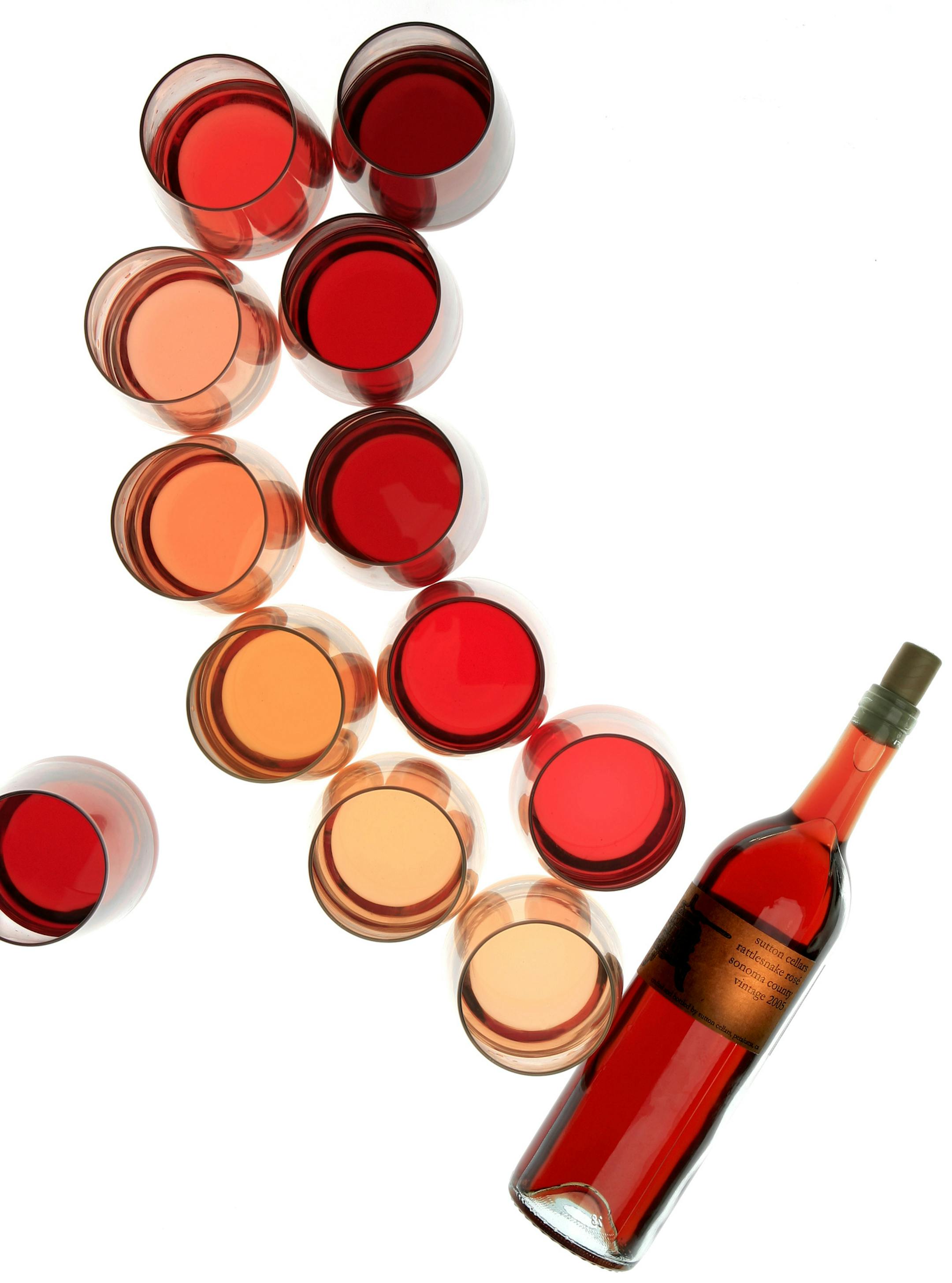 Steve Rice &#x2022; Tom Wallace
srice@startribune.com and twallace@startribune.com
Minneaoplis, 07/24/2007 - Rose' illustration: Full bottle is Sutton Cellars Rattlesnake Rose', single wine on left is Alois Lageder, light rose's from bottle to top: Domaine du Dragon, Domaines Bunan, Tavel, Chinon, Pavao Vinho, Tablas Creek. Darker Rose's from bottle to top: Yangarra, Fouassier, Sutton Cellars Rattlesnake, Me'nage a Trois, Mesar.