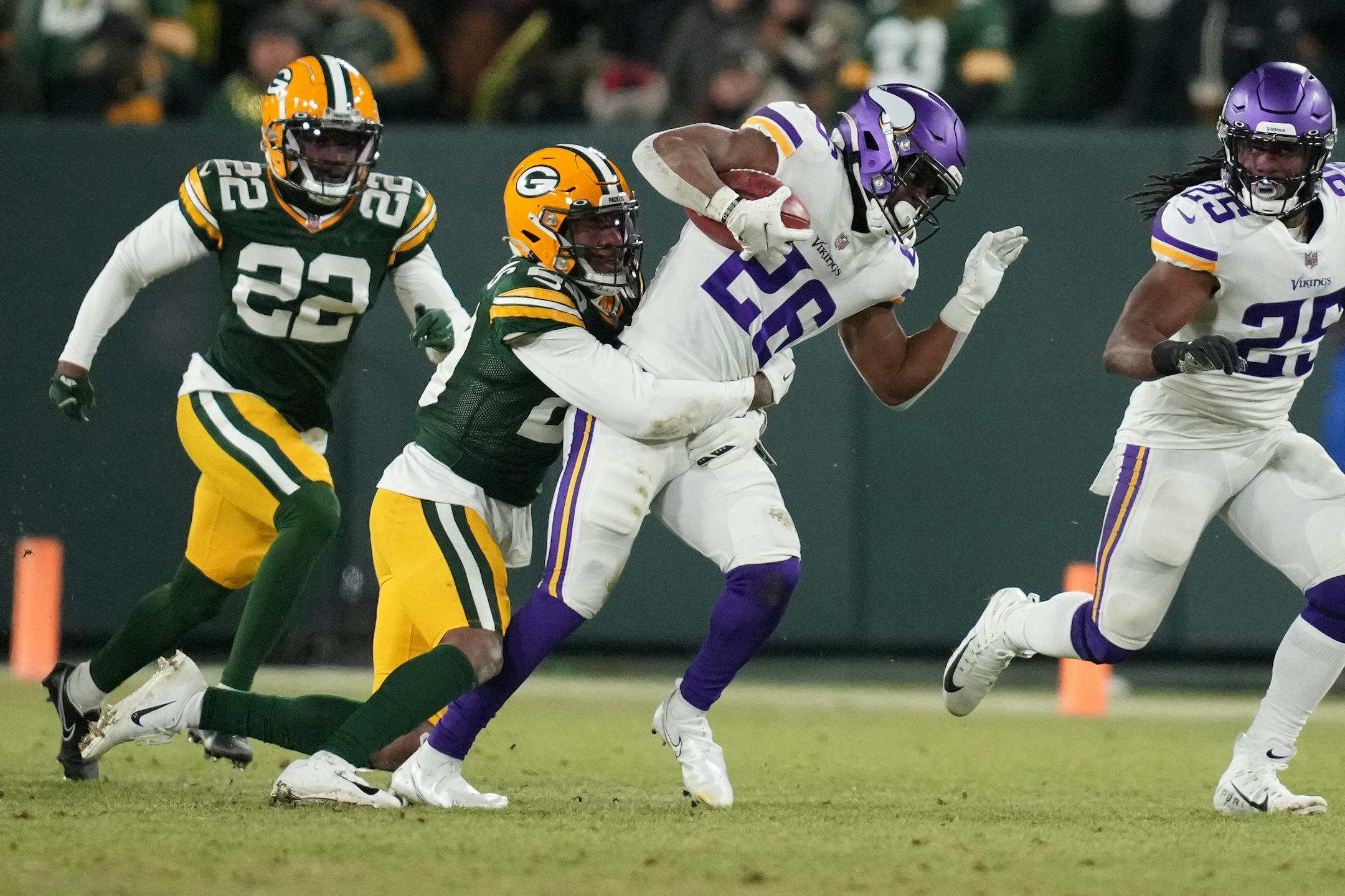 Minnesota Vikings running back Kene Nwangwu (26) was brought down by Green Bay Packers cornerback Rasul Douglas (29) in the third quarter of an NFL game between the Minnesota Vikings and the Green Bay Packers Sunday, Jan. 2, 2022 at Lambeau Field in Green Bay, Wis. ] ANTHONY SOUFFLE • anthony.souffle@startribune.com